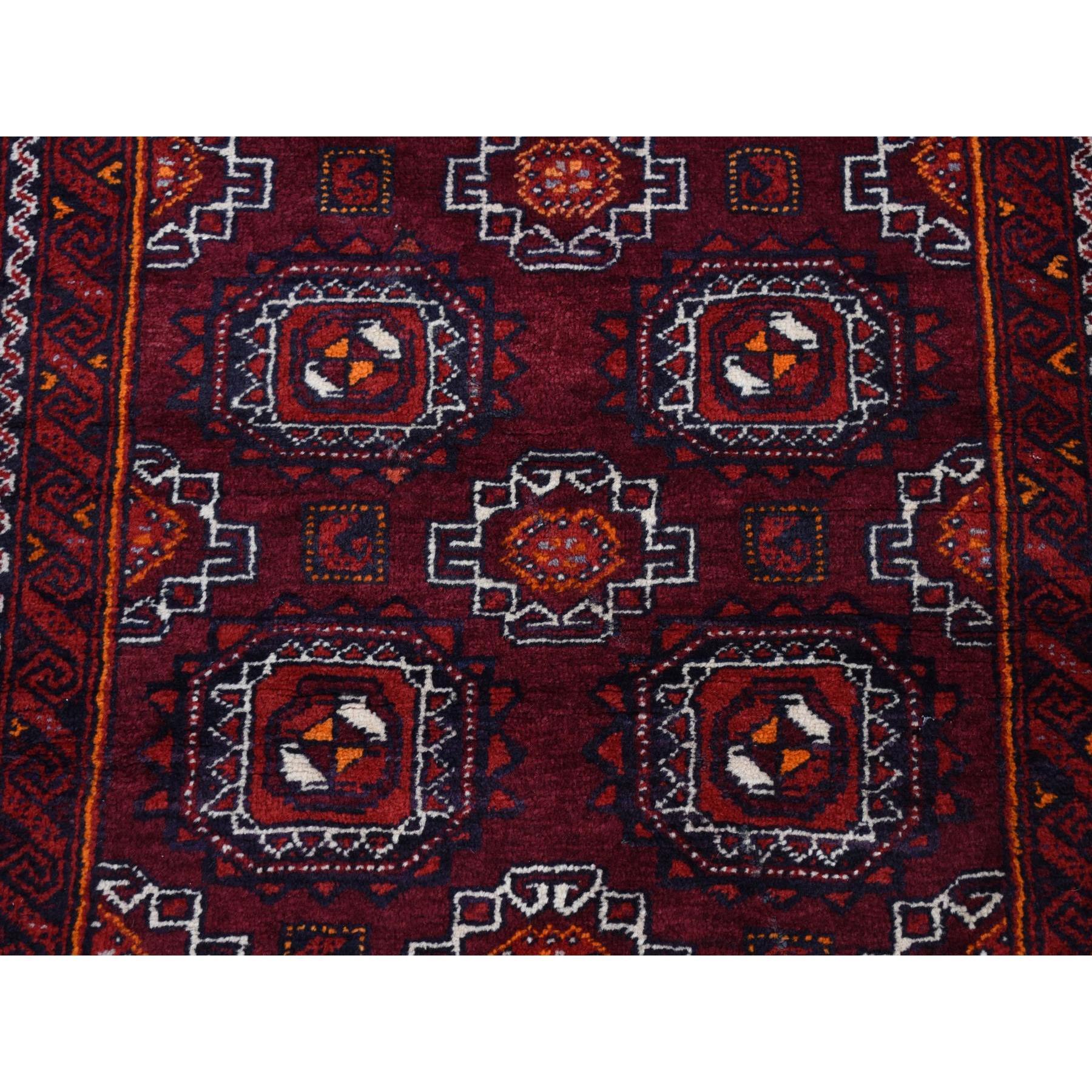 Maroon Red Vintage Tourkaman Bokara Gul Motif Pure Wool Hand Knotted Runner Rug In Good Condition For Sale In Carlstadt, NJ