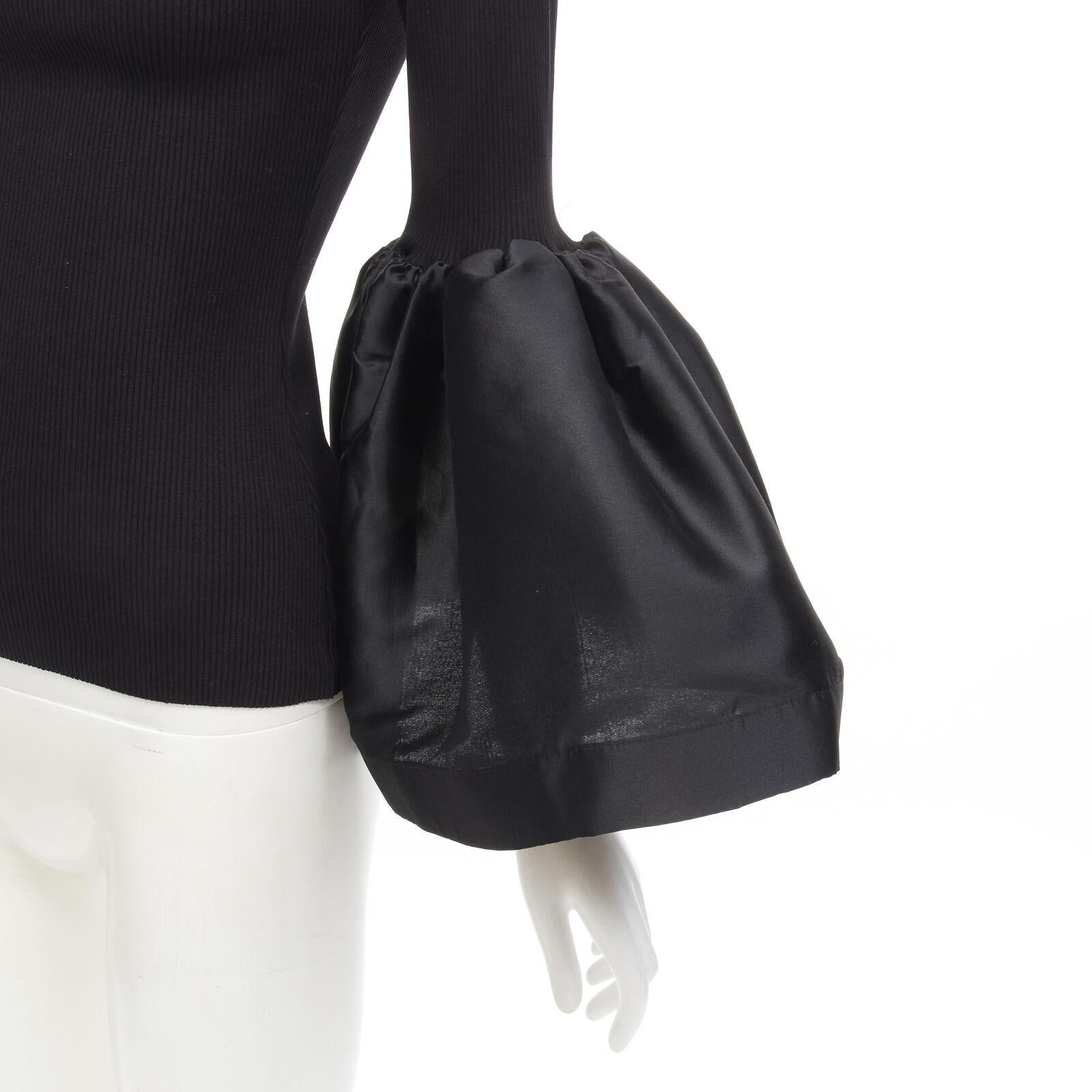 MARQUES ALMEIDA black turtleneck ribbed jersey puff sleeve top XS
Reference: AAWC/A00221
Brand: Marques Almeida
Collection: 2020 - Runway
Material: Cotton, Blend
Color: Black
Pattern: Solid
Made in: Portugal

CONDITION:
Condition: Excellent, this