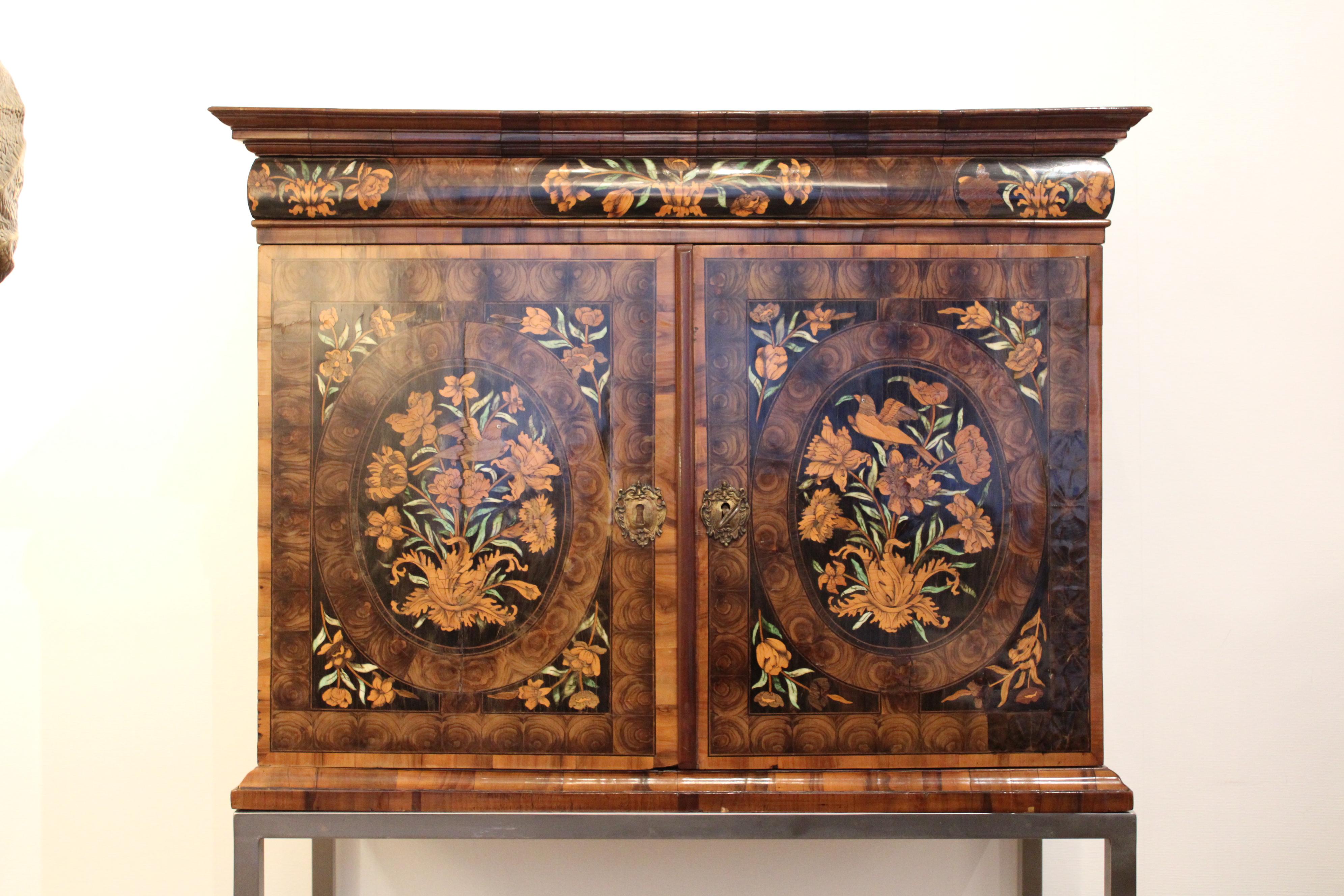 Marquetry cabinet, late 18th century 
French work
Base from the 70's