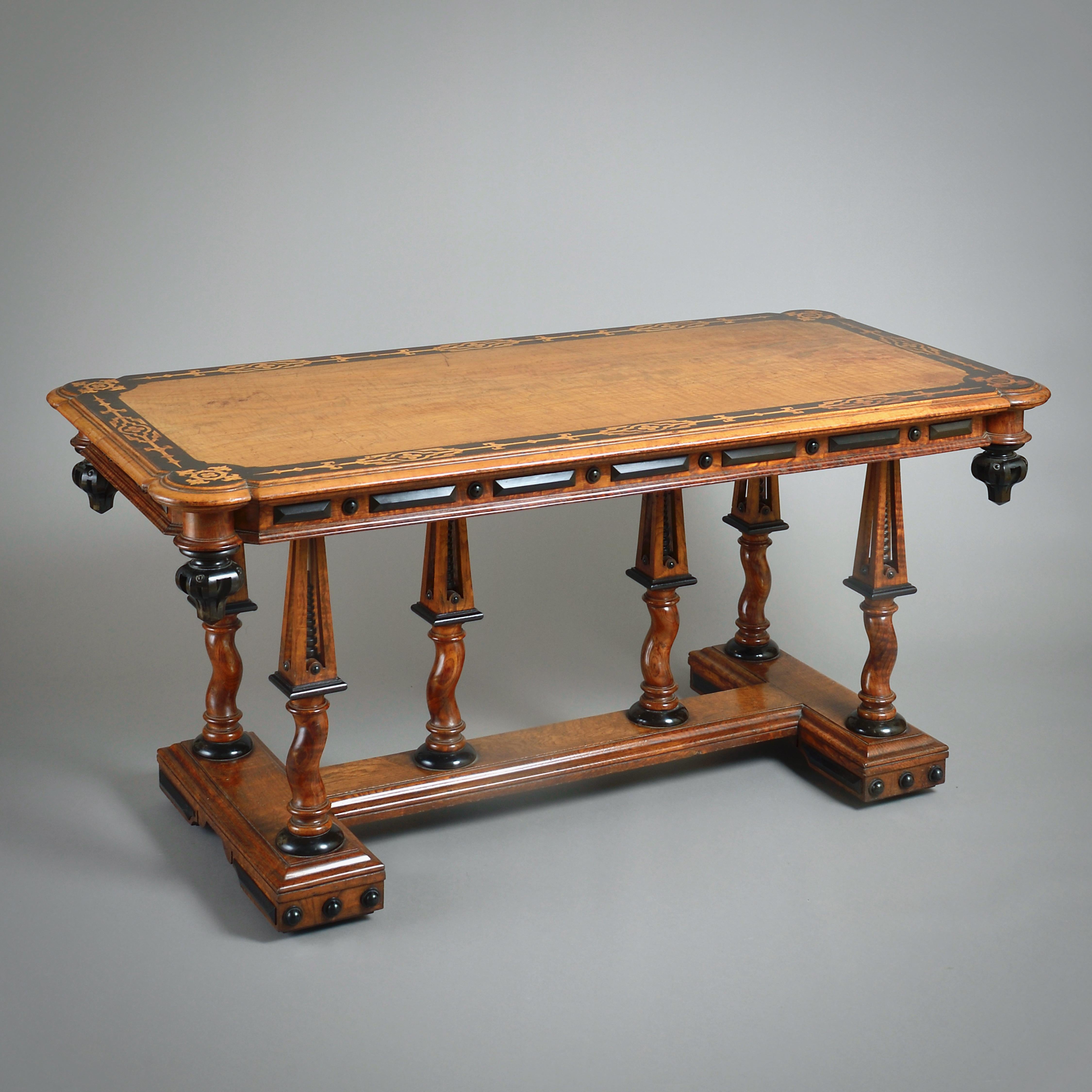 A FINE MARQUETRY-INLAID ASH AND EBONISED CENTRE TABLE IN THE MANNER OF RICHARD BRIDGENS, Circa 1830.