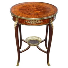 Marquetry inlaid Louis XVI style gueridon, circa 1890.