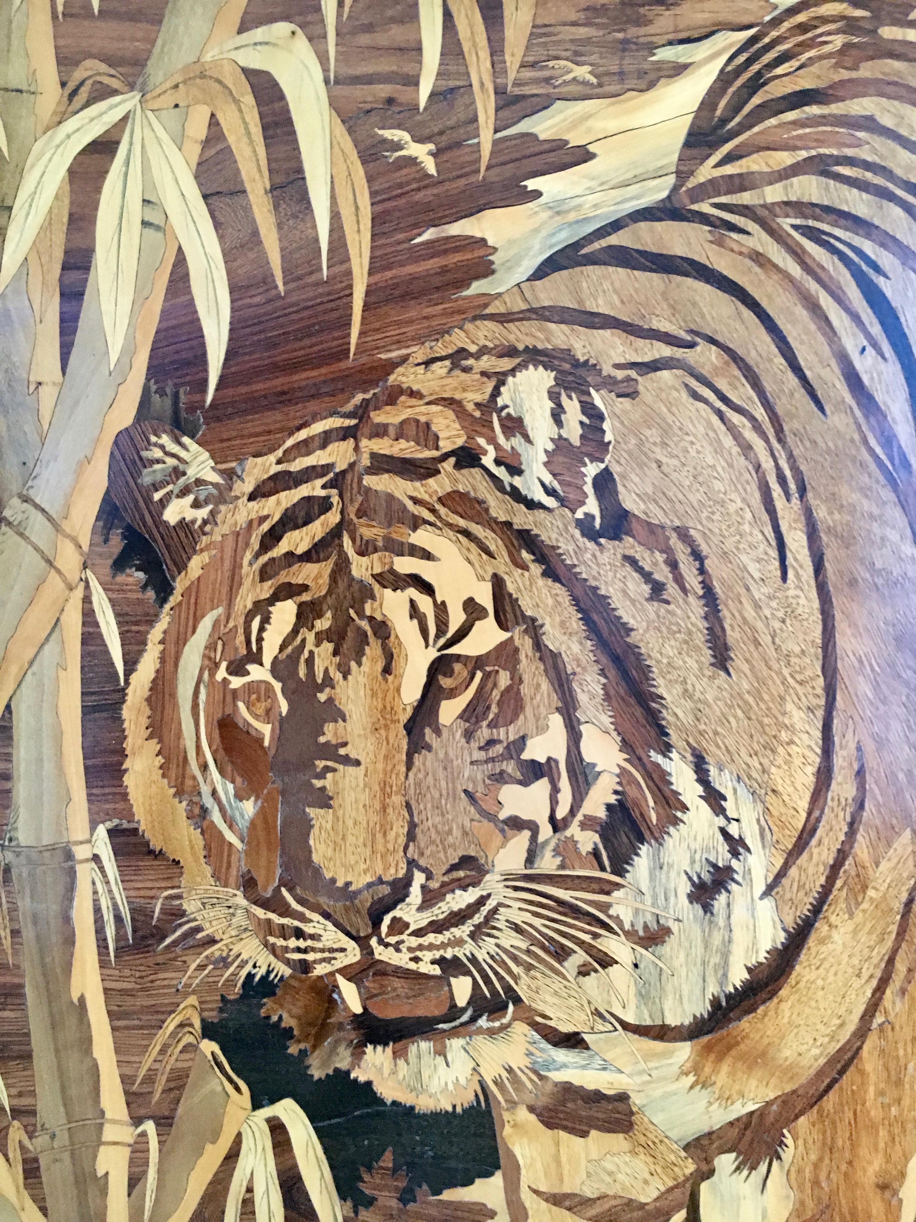 Intricately detailed inlaid marquetry image of a lion in the wild. Fabricated of cherry, maple, rosewoods and more. A handsome display of time and quality in this Folk Art piece - perfect for the nature, animal lover to proudly hang in many rooms.