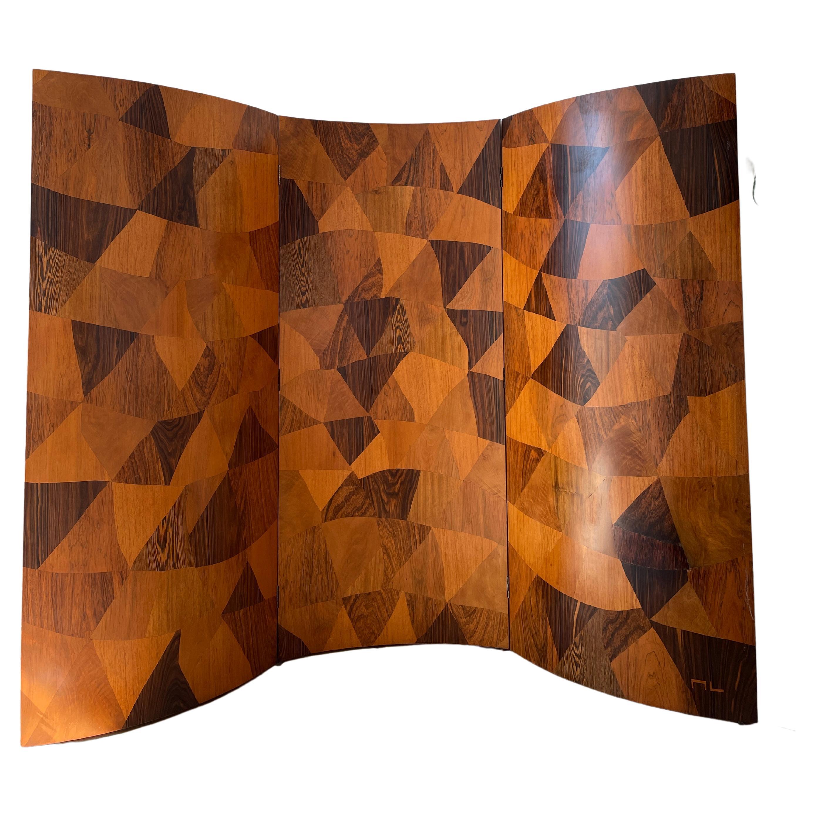 Height: 106cm
Width: 210cm

Designer: Michel Lefevre
Date: 1960s
Signed: Signed
Materials: Wood

Description: Made in the 1960s and newly restored by the artist himself. The Michel Lefevre Marquetry Screen is a stunning and intricately crafted piece