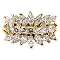 Bague à trois rangées de diamants taille marquise et rond brillants en or jaune 18 carats