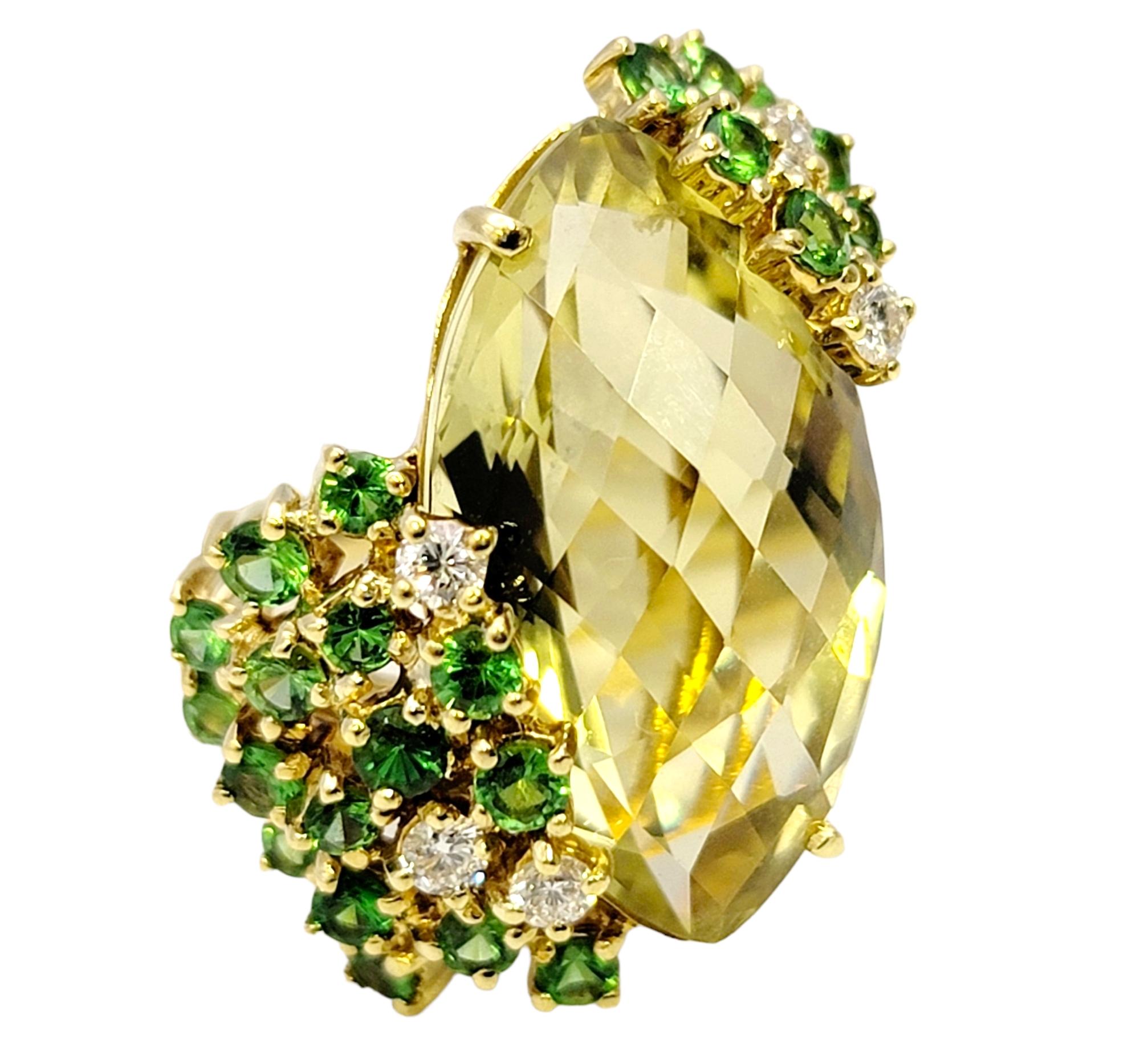 Ring size: 5.75

Introducing a captivating statement piece that is as unique as it is beautiful. This 18 karat yellow gold marquis cut lemon quartz cocktail ring fills the finger with bold color and sophistication. Whether you wear it to a glamorous