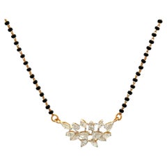 Collar vintage de oro con racimo de diamantes marqués y pera y cuentas de ónice