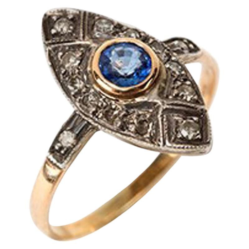 Marquis Ring with Sapphire and 12 Diamonds, circa 1920 For Sale