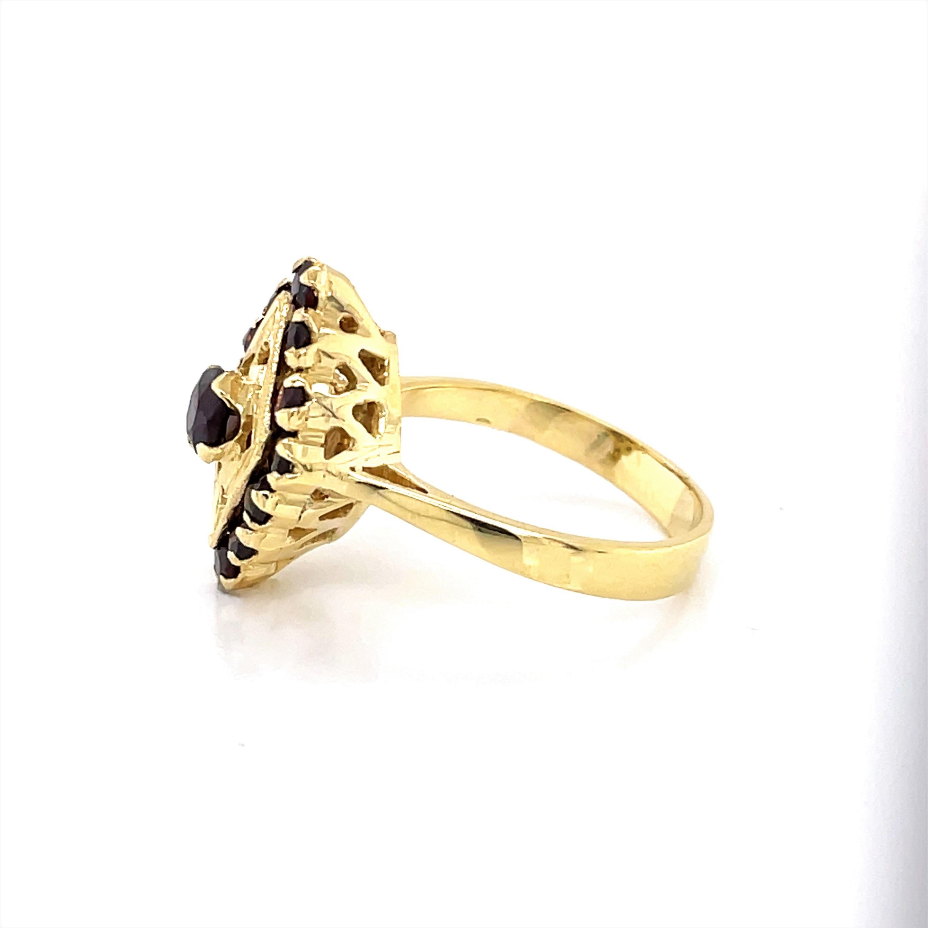 Women's Marquise 18 Karat Yellow Gold Garnet Ring For Sale