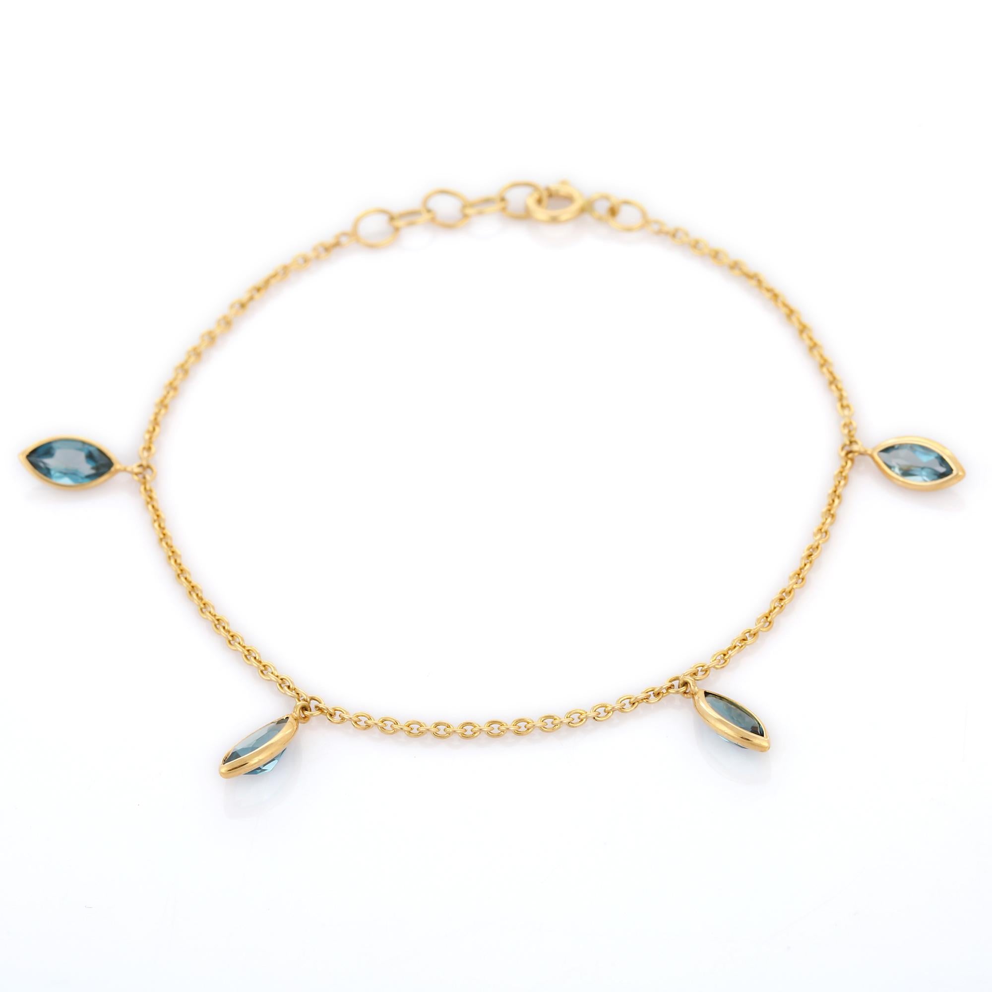 Marquise 2.54 Ct Blue Topaz Dangling Charm Bracelet Inlaid in 18K Yellow Gold In New Condition For Sale In New York, NY