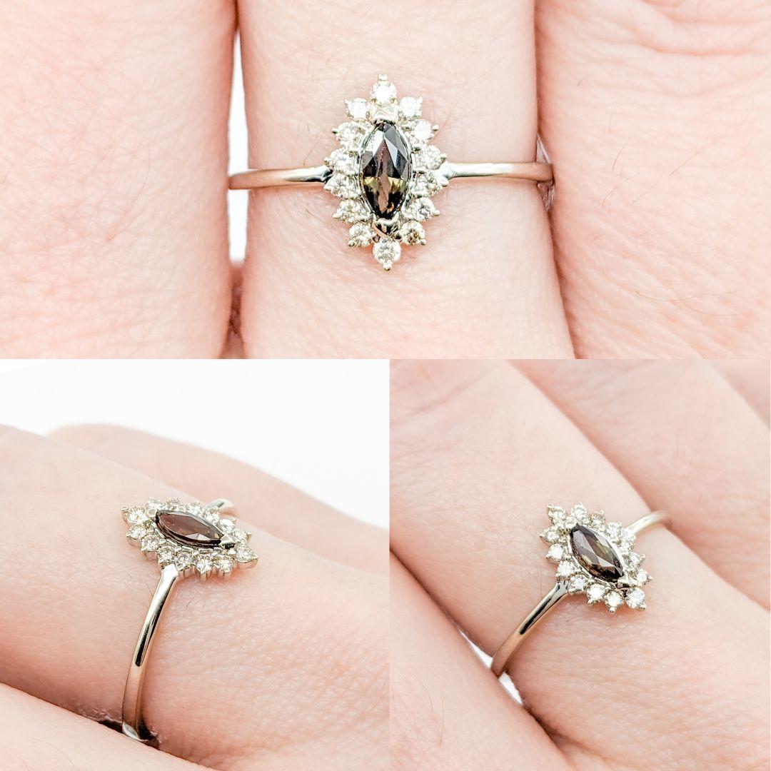 Marquise Alexandrite With Diamonds In White Gold GIA

Introducing this beautiful ring, crafted in 14kw white gold. It features a 0.23ct green to purplish brown color-changing Alexandrite, one of the rarest gemstones on earth(GIA certified).
