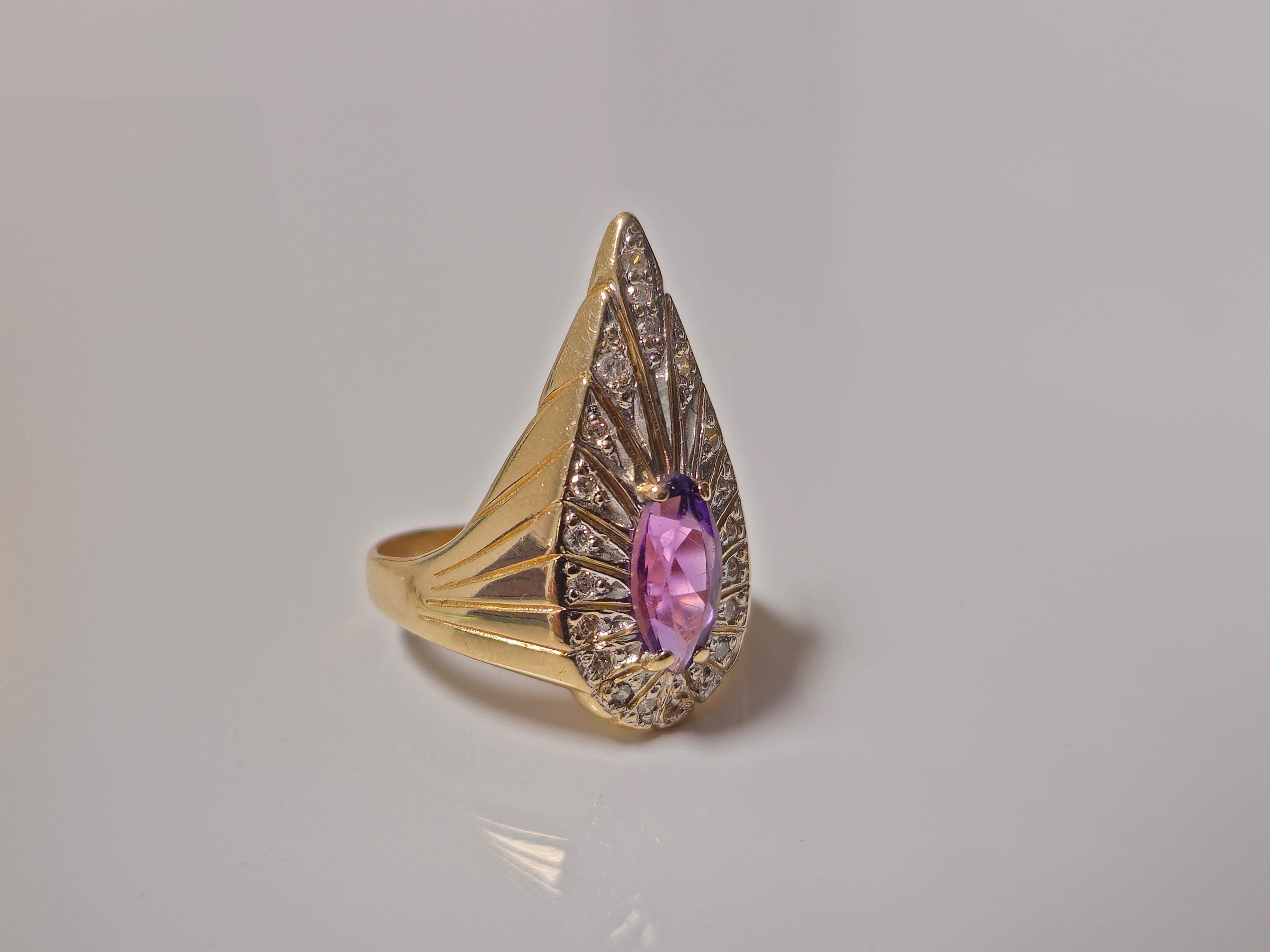This 14k gold ring weighs 5.85 grams and features a marquise-shaped 0.50-carat amethyst complemented by 0.50 carats of diamonds with SI clarity and G color. Sized at US 7, it's a striking combination of amethyst and diamonds.

Key Features:

14k.