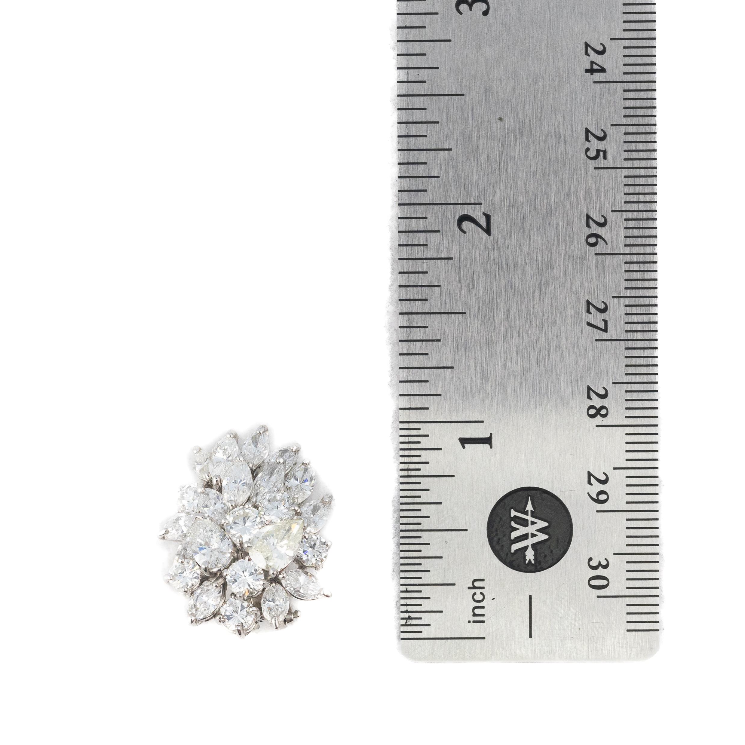 Marquise and Brilliant Diamond Cluster Earrings in White Gold

A dazzling symphony of light and brilliance, these magnificent diamond cluster earrings capture the essence of timeless elegance. Showcasing a spectacular arrangement of marquise and
