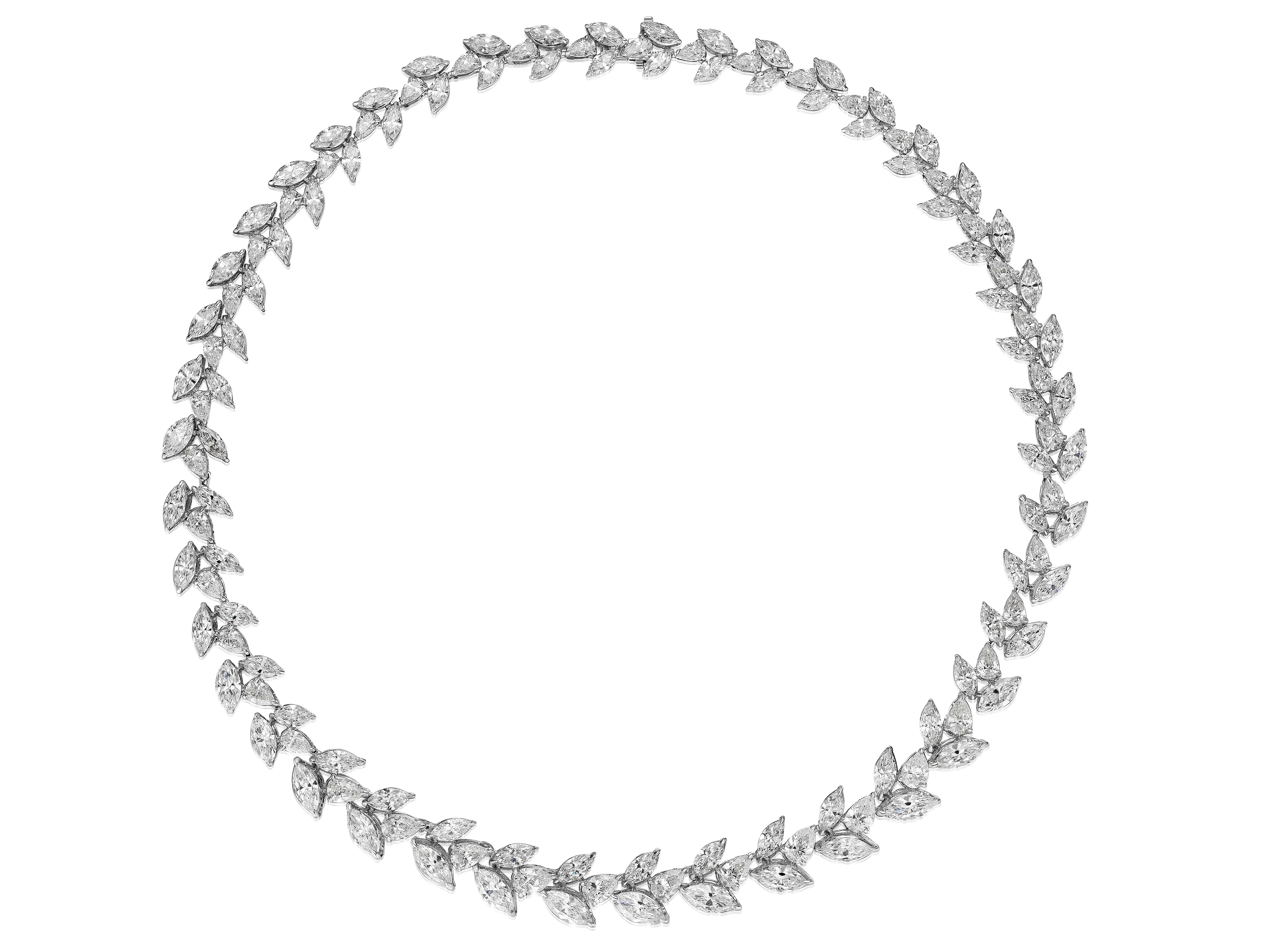 Gorgeous necklace comprised of 132 Marquise and Pear shaped diamonds weighing a total of 41.25 Carats.
88 Marquise shaped Diamonds weighing 27.57 Carats.
44 Pear shaped Diamonds weighing 13.68 Carats.
Measures 17 inches.
Set in 18 Karat White Gold.