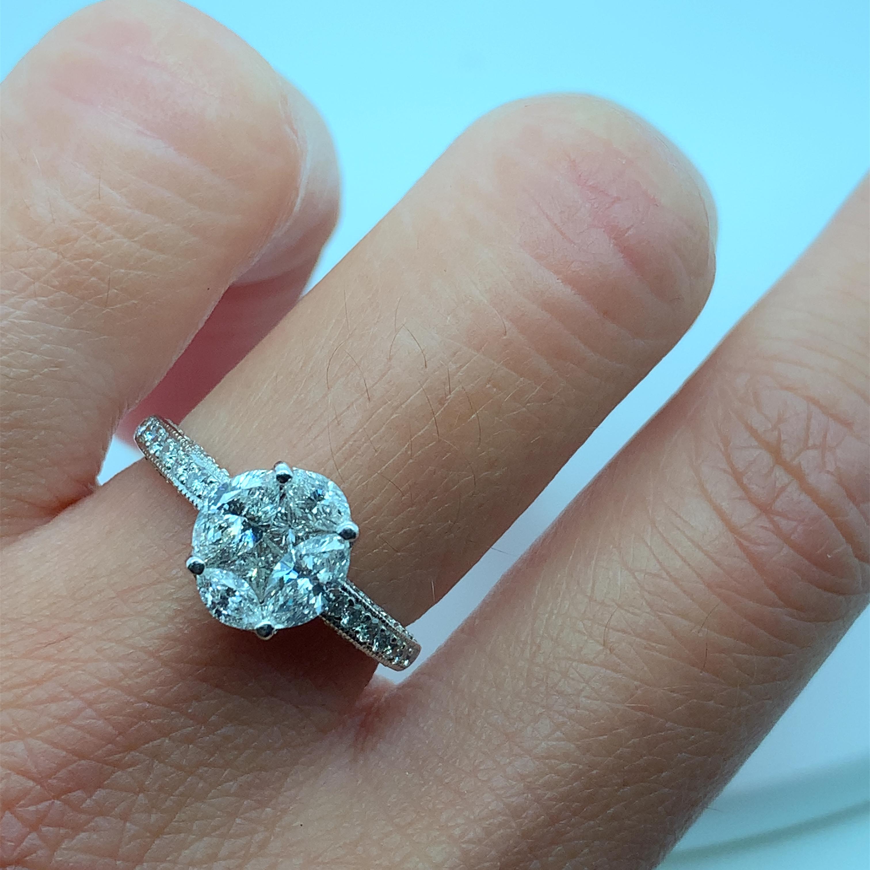 2.02ct marquise and princess diamond engagement ring invisible set halo in 18ct white gold
Princess and marquise diamonds cut solitaire engagement ring wedding band.
The ring can be resized
Centre diamond weight 1.62ct F colour VS1