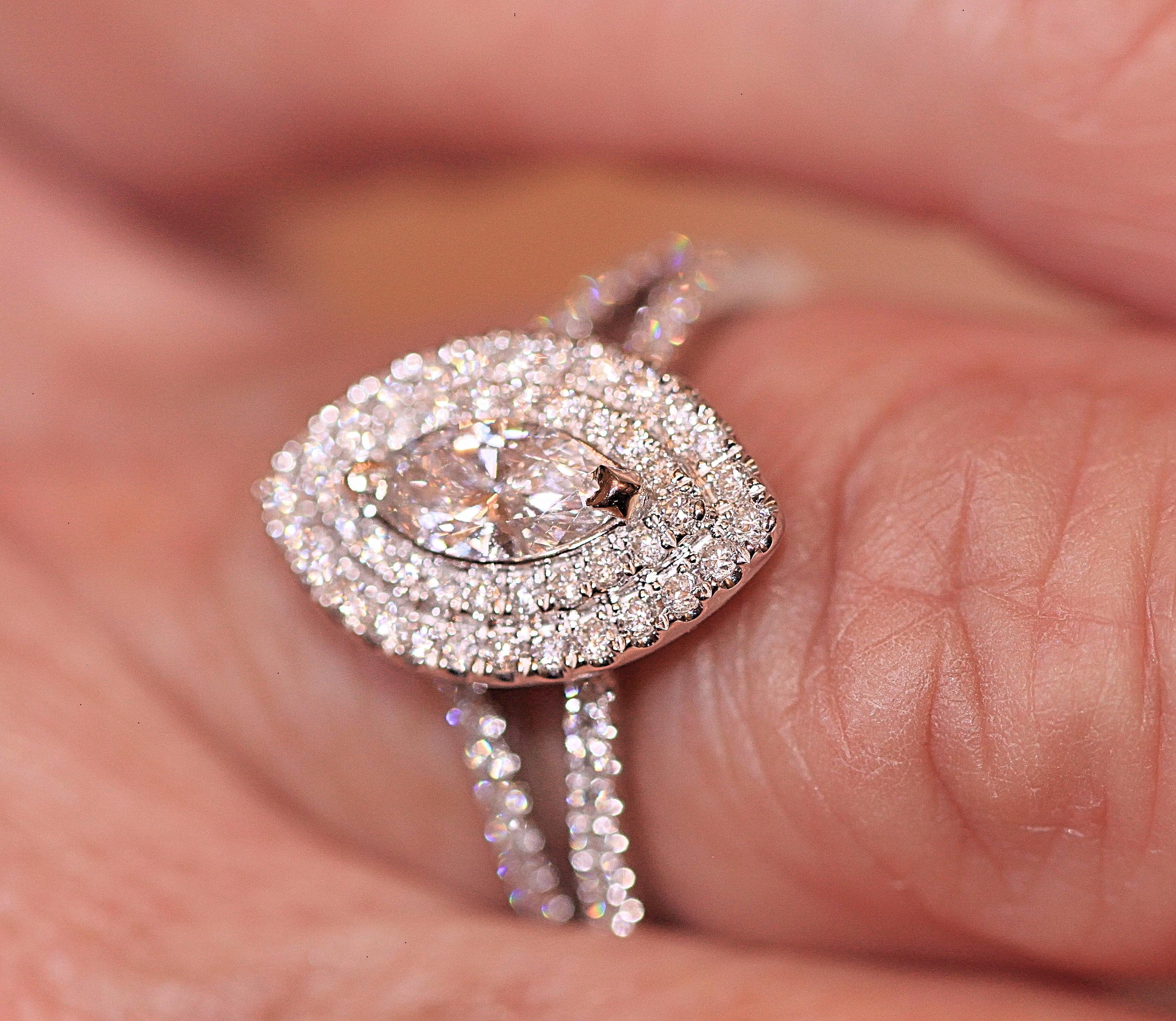 marquise engagement ring on hand