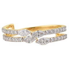 Bague à double anneau entrecroisés, sertie de diamants taille marquise et ronde, en or jaune massif 14 carats