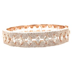 Armband aus massivem 18-karätigem Roségold mit marquisen und runden Diamanten verziert