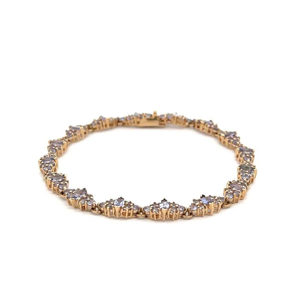 Mixed Cut Marquise and Round Tanzanite Gold Cluster Link Vintage Bracelet For Sale