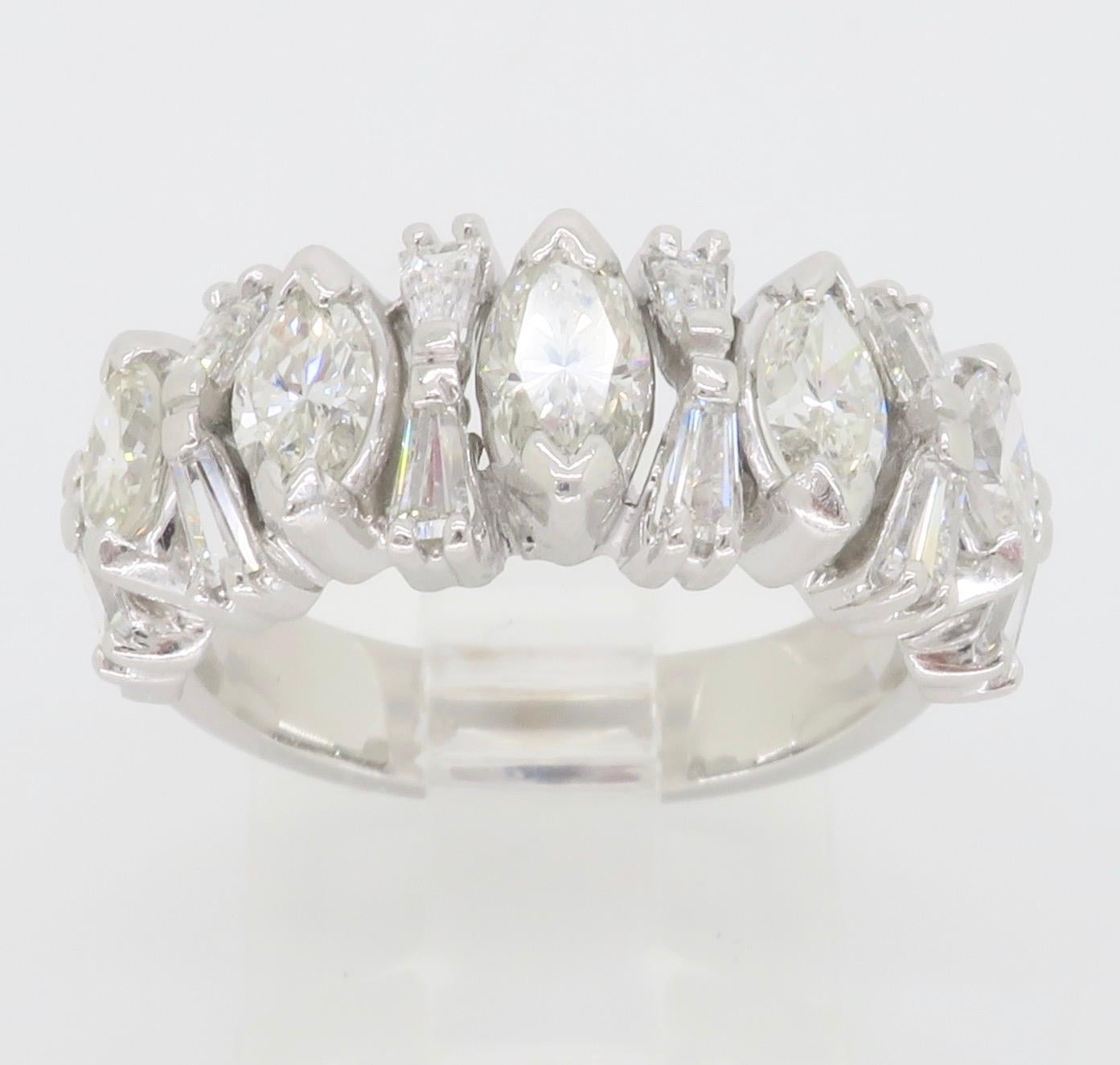 Custom made diamond band made with Marquise Brilliant and Tapered Baguette diamond ring. 

Diamond Cut: Marquise Brilliant & Tapered Baguette 
Total Diamond Carat Weight: Approximately 1.68CTW
Average Diamond Color: F-H
Average Diamond Clarity: