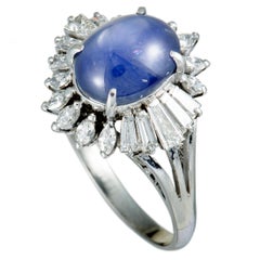 Marquise and Tapered Baguette Diamonds and Oval Sapphire Cabochon Platinum Ring Marquise and Tapered Baguette Diamonds and Oval Sapphire Cabochon Platinum Ring