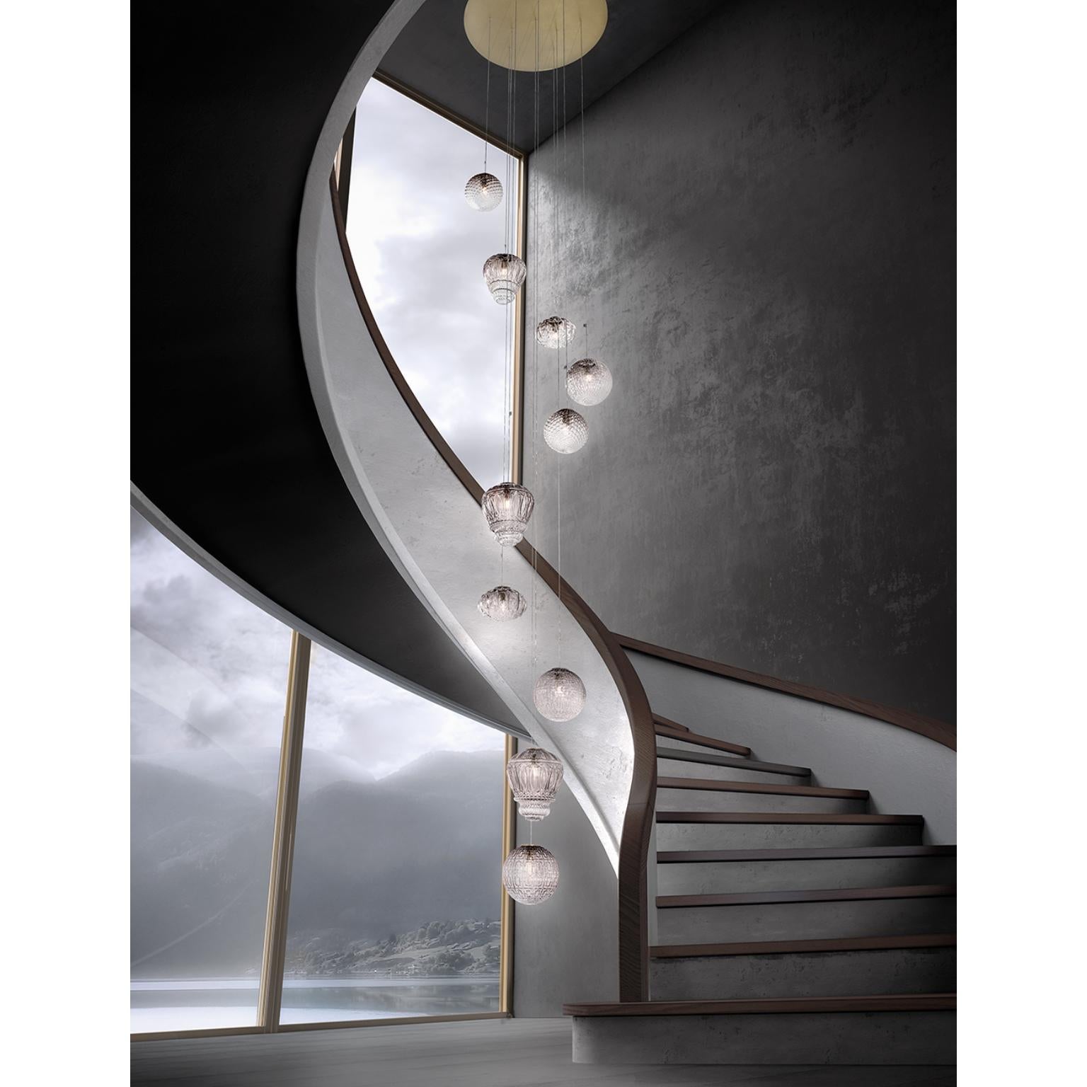 Lampada a sospensione Marquise Arabesque di MM Lampadari
Dimensioni: Ø 25 x H. 25 cm.
Materiali: Metallo e vetro.

Sono disponibili diverse finiture. Tutte le nostre lampade possono essere cablate a seconda del Paese. Se viene venduto negli Stati