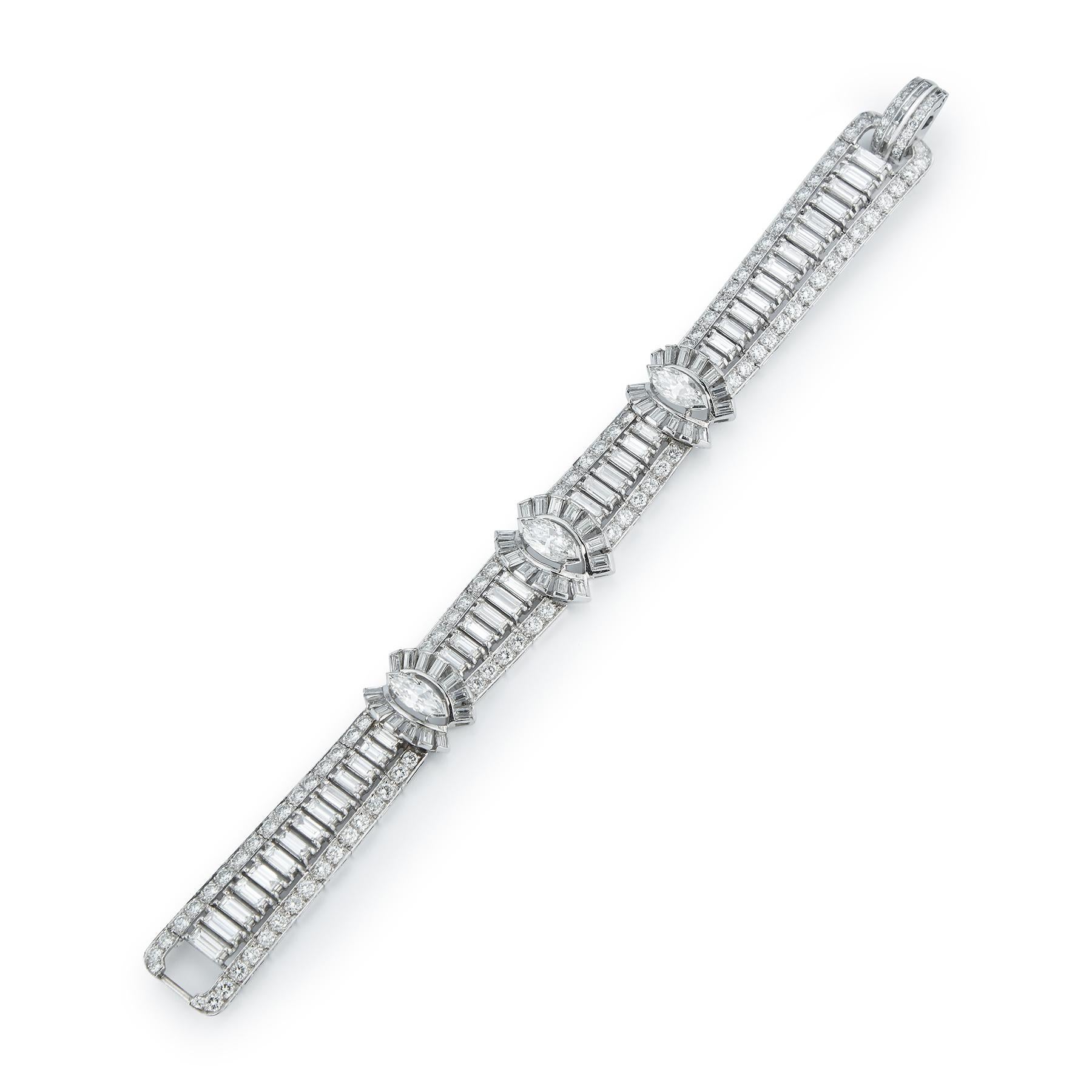 Marquise & Baguette Cut Diamond Three Row Bracelet 
Total Carat Weight: approximately 15.00 cts 

Center Marquise diamond Weight: approximately 1.30-1.40 Cts 

Side Marquise Weight: approximately 2.20 cts 

Measurements: 7