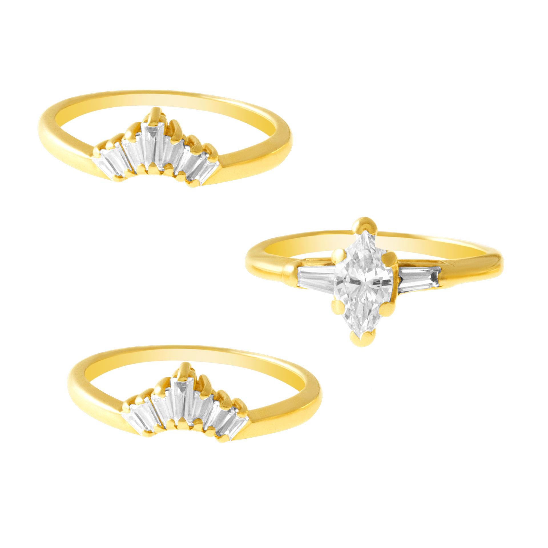 Marquise and baguette diamond engagement ring with jacket in 14k yellow gold. Approx. 0.90 cts in marquise and baguette diamonds. Size 6.5.

This Diamond ring is currently size 6.5 and some items can be sized up or down, please ask! It weighs 4