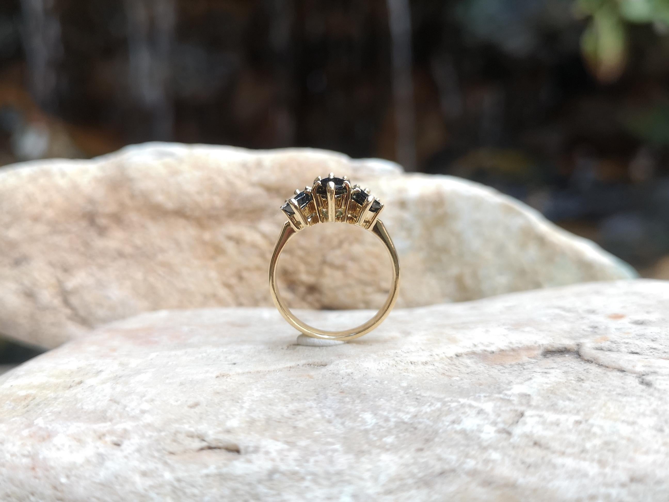 Women's Marquise Blue Sapphire Ring Set in 18 Karat Gold Settings For Sale