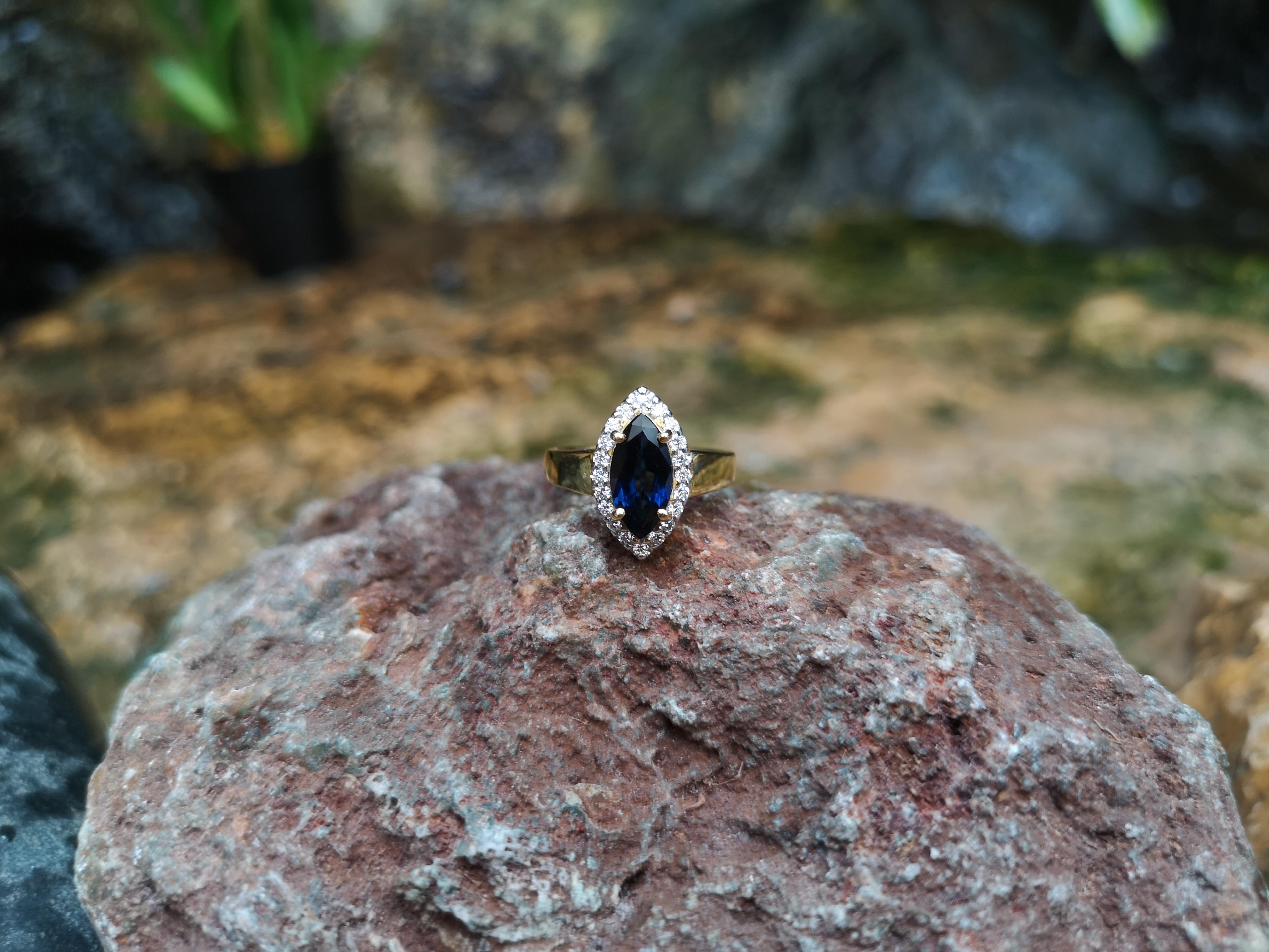 Women's Marquise Blue Sapphire with Diamond Ring Set in 18 Karat Gold Settings For Sale