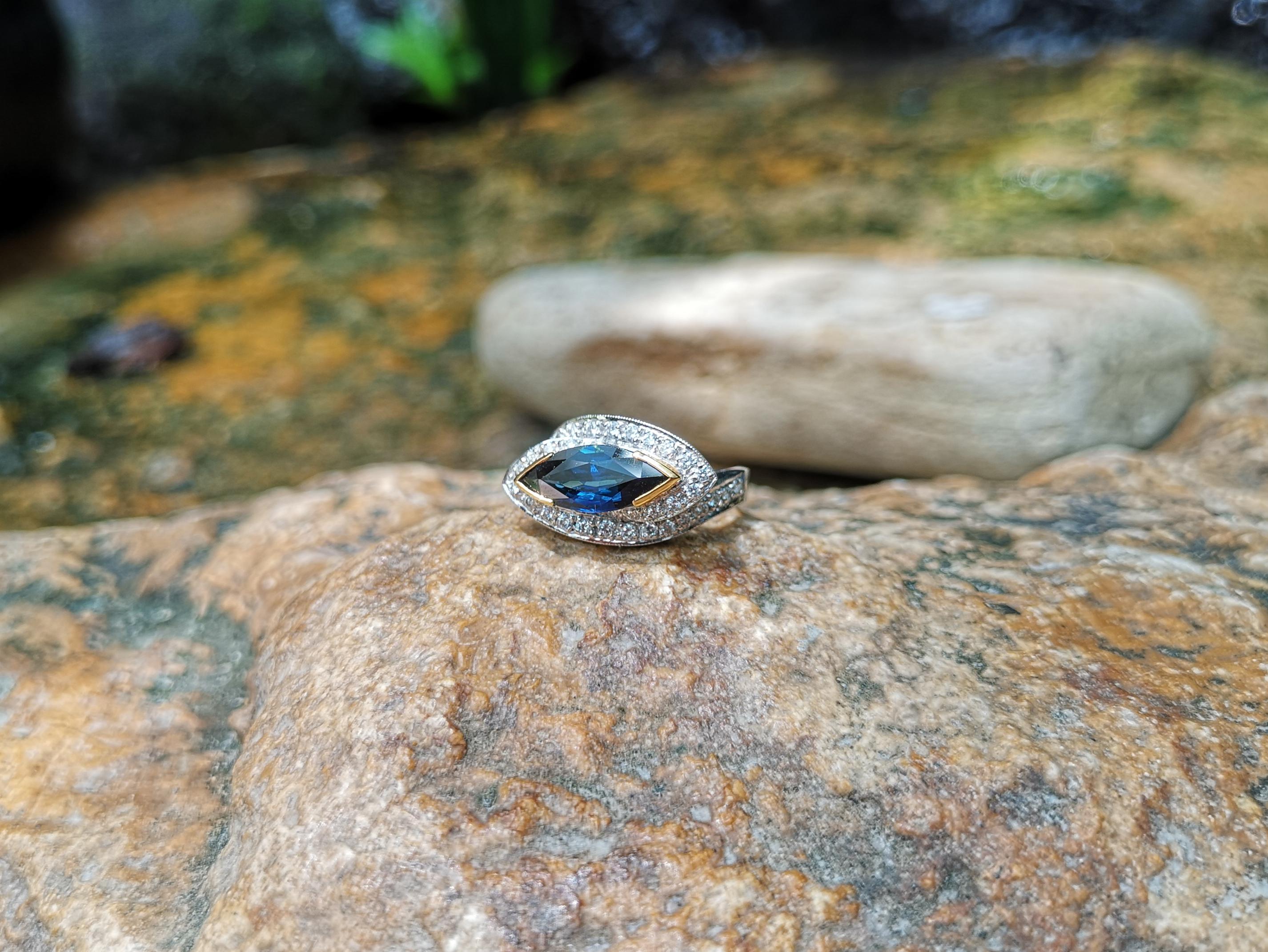 Women's Marquise Blue Sapphire with Diamond Ring Set in 18 Karat White Gold Settings For Sale