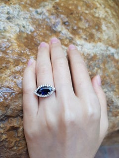 Marquise Blue Sapphire with Diamond Ring Set in 18 Karat White Gold Settings