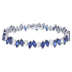 Bracelet tennis de 17,5 carats en or 18 carats, saphirs bleus marquises et diamants poire