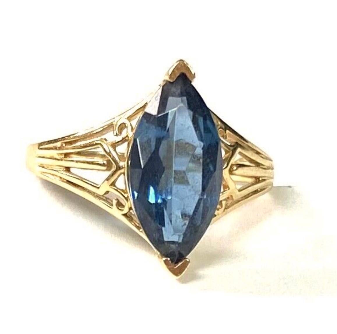 Modern Marquise Blue Topaz 14K Yellow Gold Ring For Sale