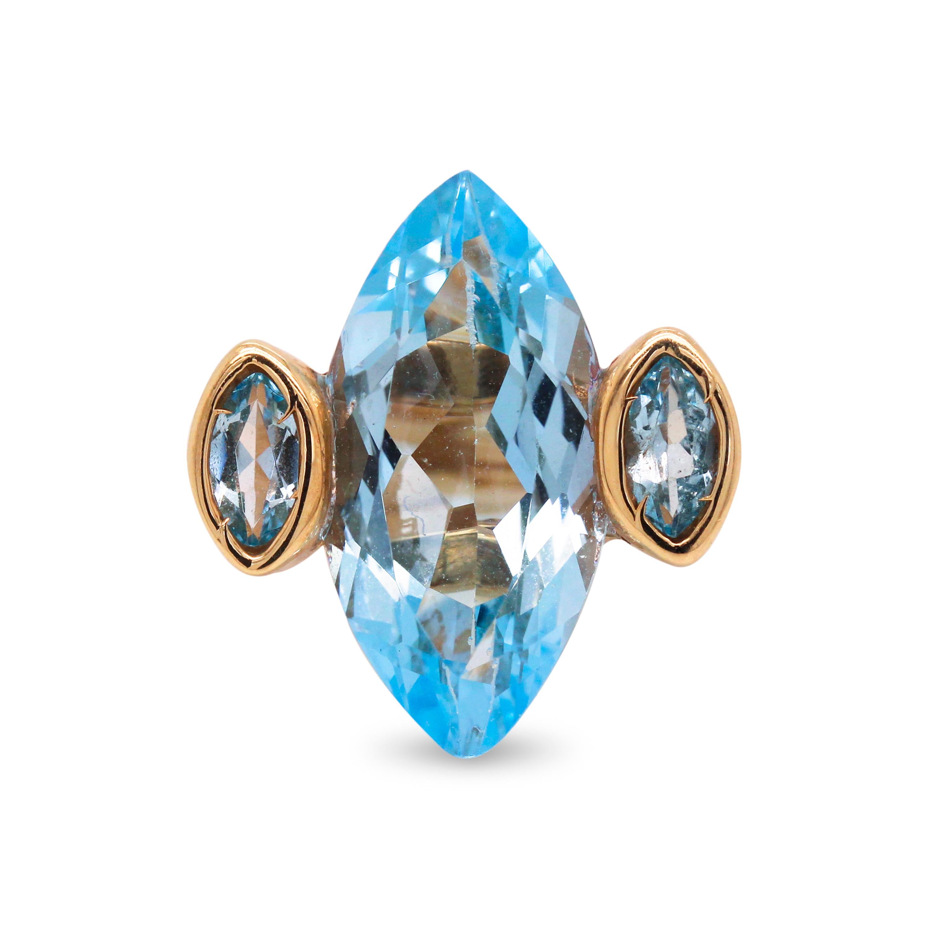 Marquise Blue Topaz 14K Yellow Gold Three Stone Cocktail Ring

A fun, cute and everyday ring brings together a large Blue Topaz center with two smaller marquise Blue Topaz on both sides. 

Made in solid 14K Gold.

Blue Topaz center is apprx. 10
