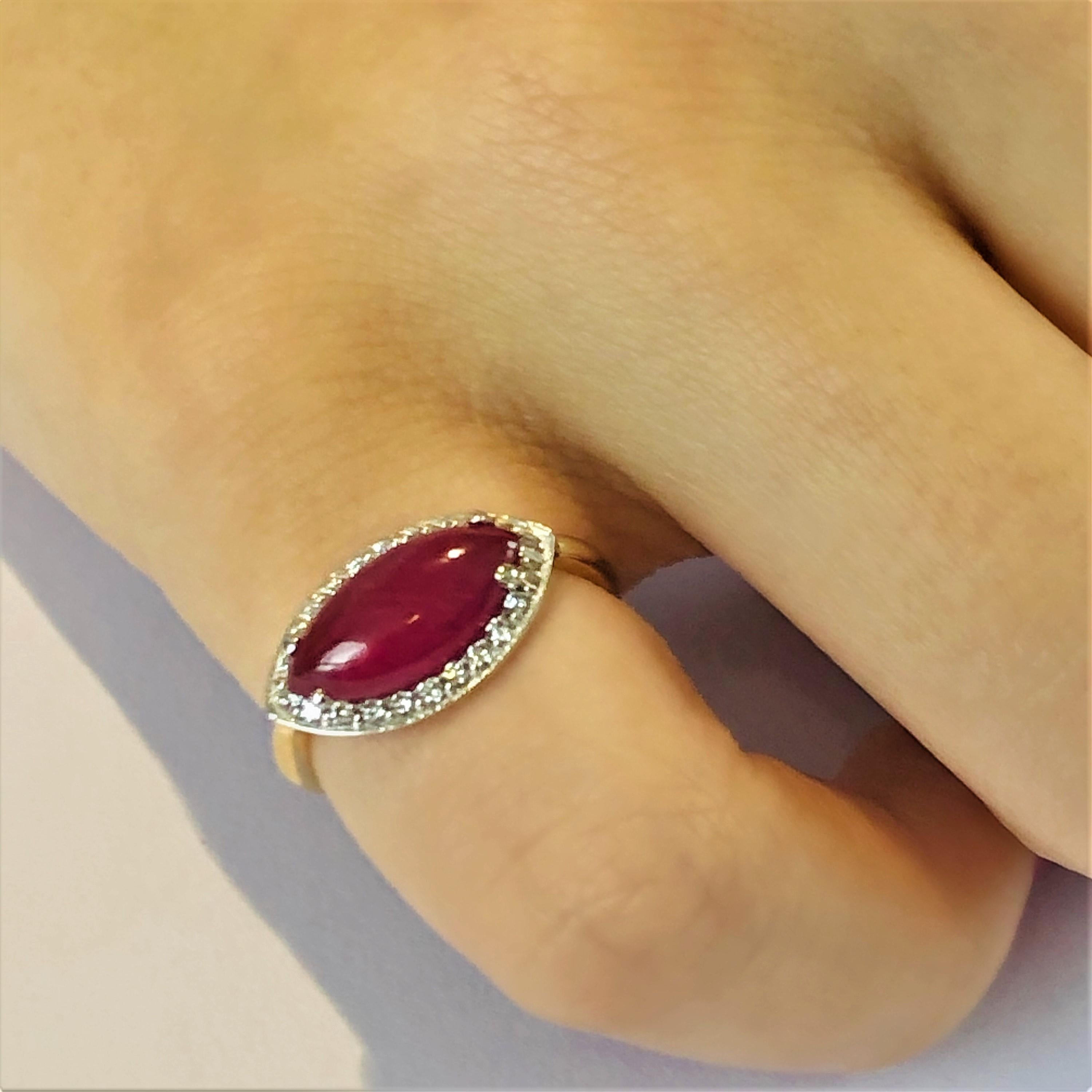 Contemporary Marquise Cabochon Ruby Set in 18 Karat Yellow and White Gold Cocktail Ring
