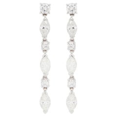 Boucles d'oreilles pendantes en or blanc 18 carats avec diamants taillés en marquise et en brillant