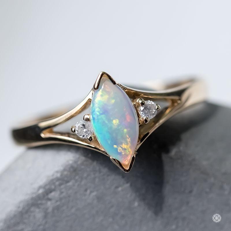 Minimalist Marquise-Cut Australian Solid Opal Diamond Ring 14K Yellow Gold.

Free Domestic USPS First Class Shipping!  Free One Year Limited Warranty!  Free Gift Bag or Box with every order!



Opal—the queen of gemstones, is one of the most