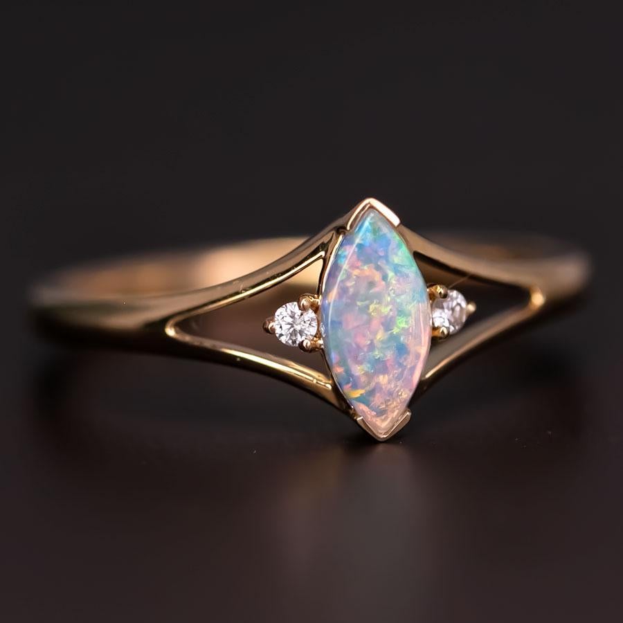 Marquise Cut Australian Solid Opal & Diamond Ring 18K Yellow Gold.


Free Domestic USPS First Class Shipping! Free Gift Bag or Box with every order!

Opal—the queen of gemstones, is one of the most beautiful gemstones in the world. Every piece of