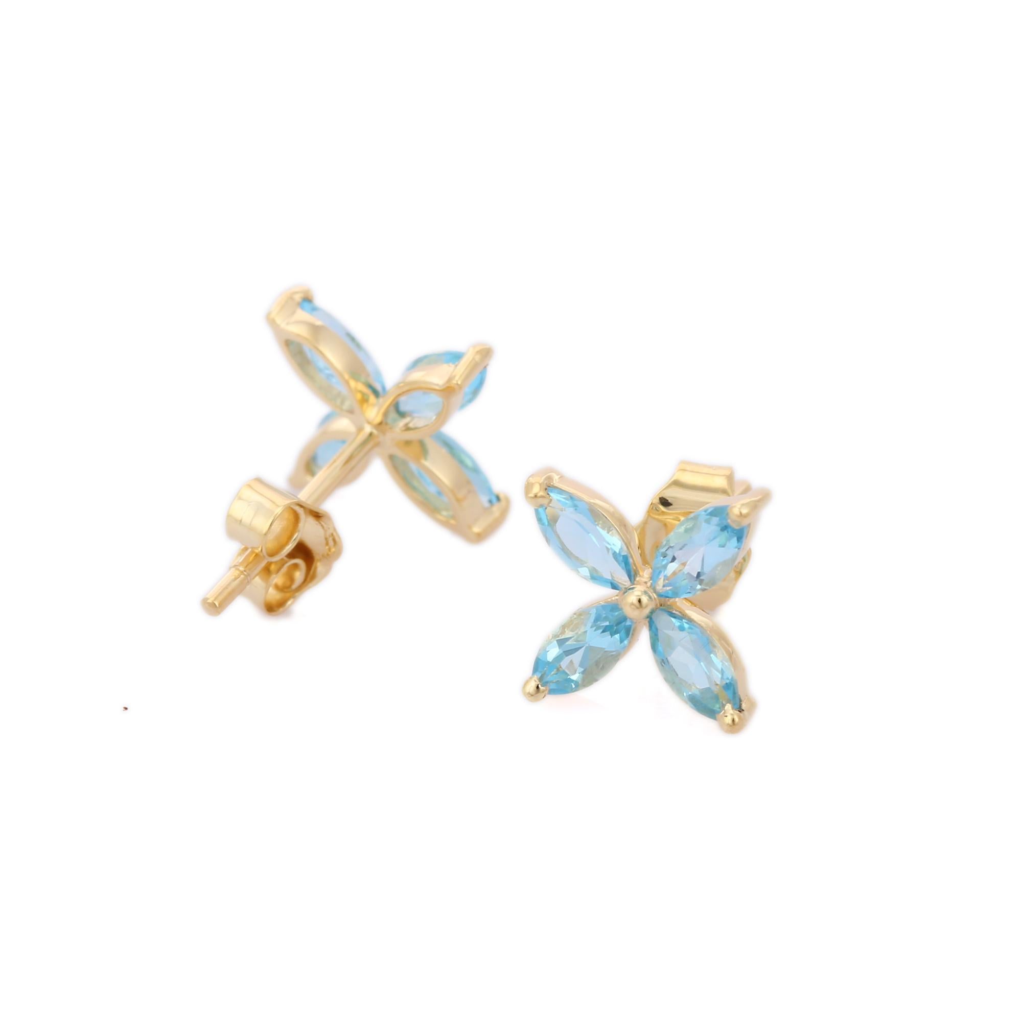 Marquise-Cut Blue Topaz Blume Ohrstecker Set in 14k massivem Gelbgold (Moderne)