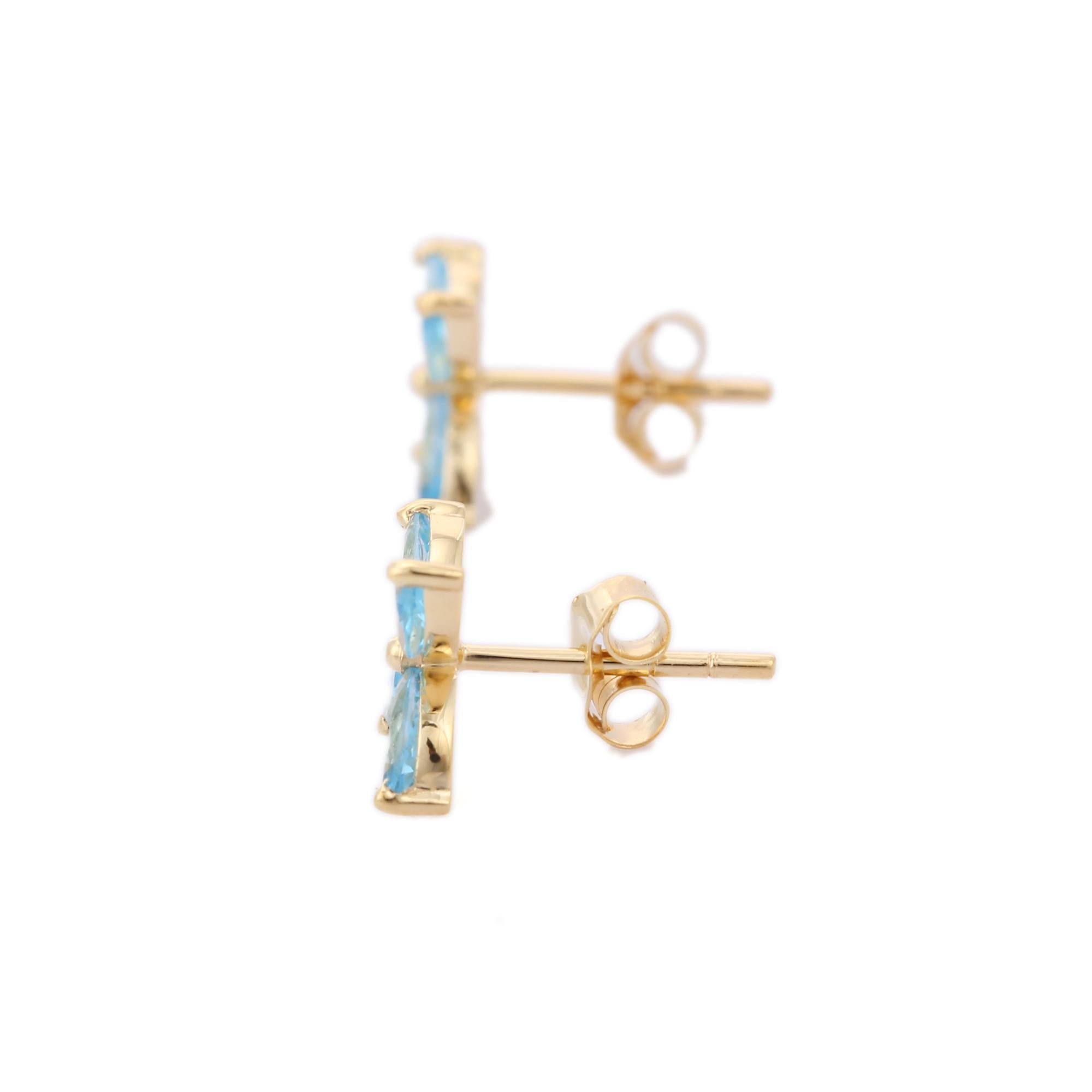 Marquise-Cut Blue Topaz Blume Ohrstecker Set in 14k massivem Gelbgold (Marquiseschliff)