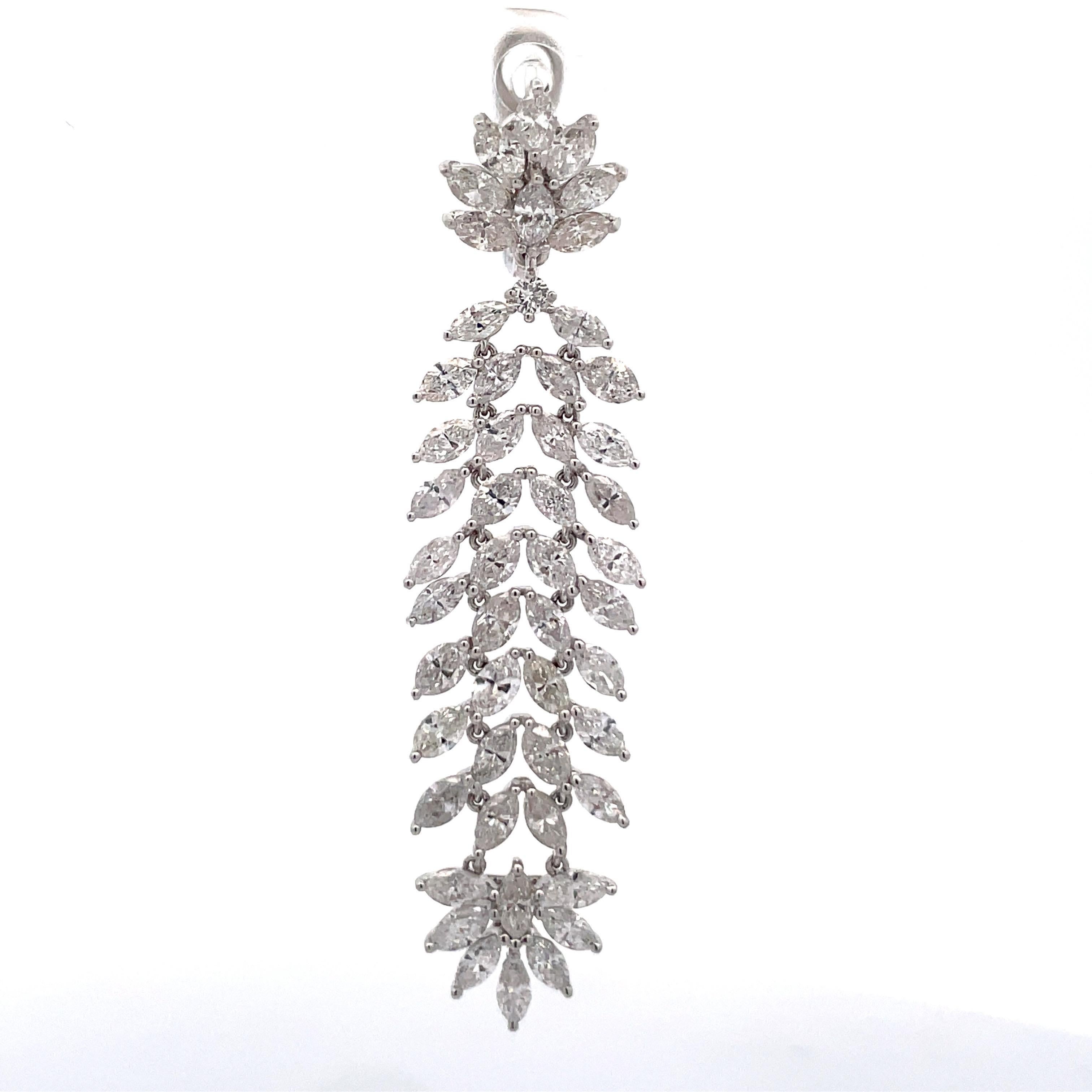 18 Karat White Gold drop earrings featuring a cluster of Marquise Cut diamonds weighing 7.81 Carats.
Nice Movement, not stiff at all.

DM for more videos & pictures.