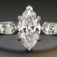 Marquise Cut Diamond Engagement Ring with Diamond Accents