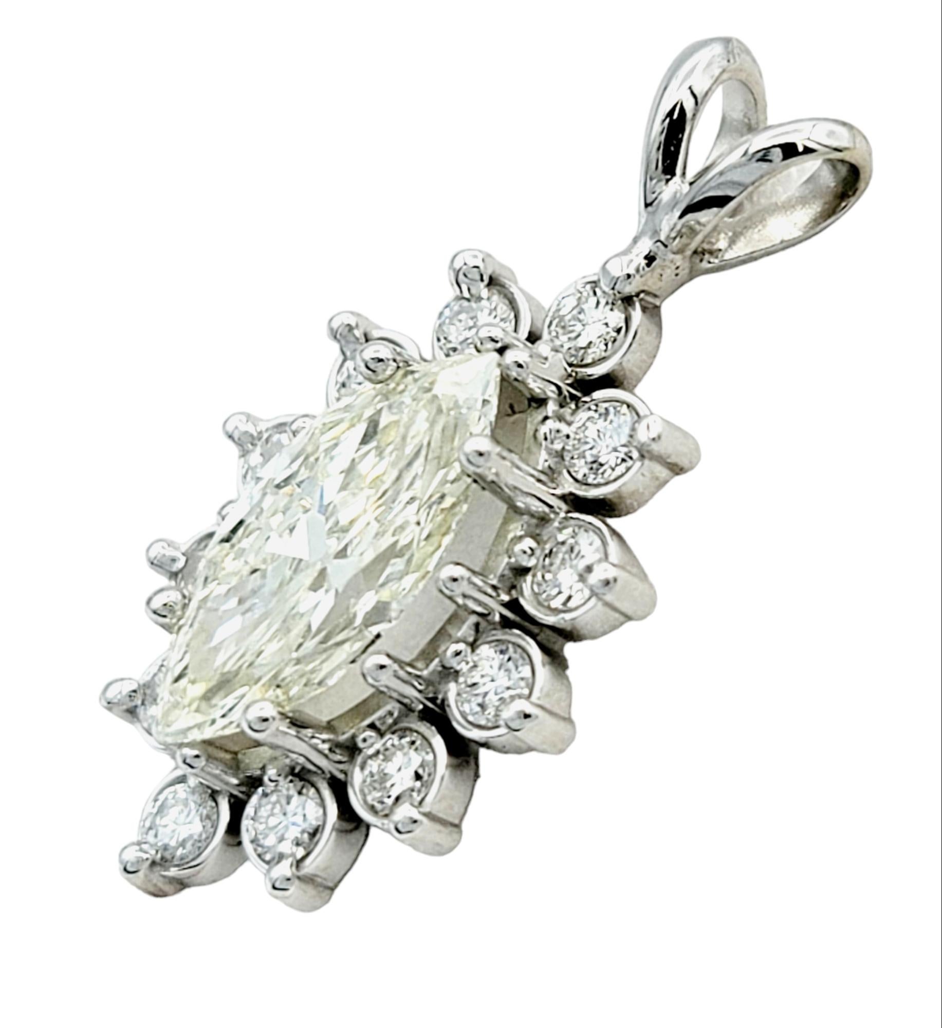 Adorn yourself with sheer elegance through this 14 karat white gold pendant, a captivating piece that radiates timeless sophistication. The pendant's centerpiece boasts a resplendent marquise-cut diamond, its elongated silhouette adding a touch of