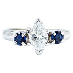 Marquise Cut Diamond & Sapphire Three-Stone Engagement Ring