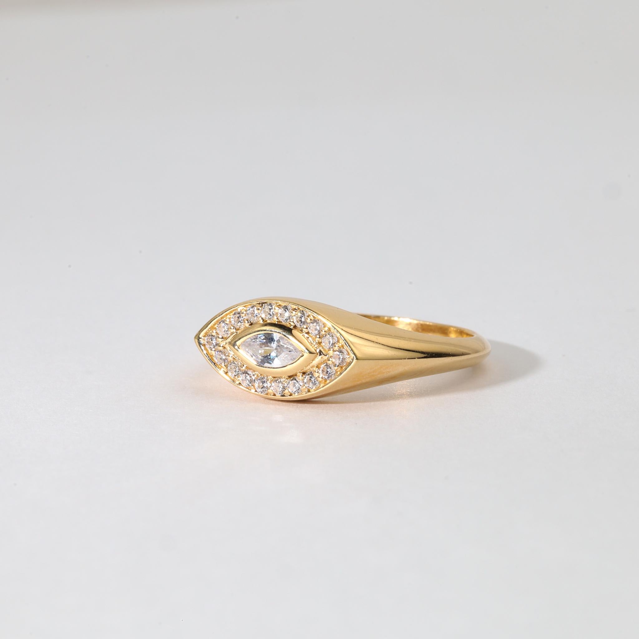 Artful Boldness. Everyday Elegance. Unmistakably Refined.

Crafted with a balance of striking geometry and timeless finesse, this 18K yellow gold signet ring centers around a rare and elegant 0.14ct natural marquise-cut diamond—graded E-F color, VS