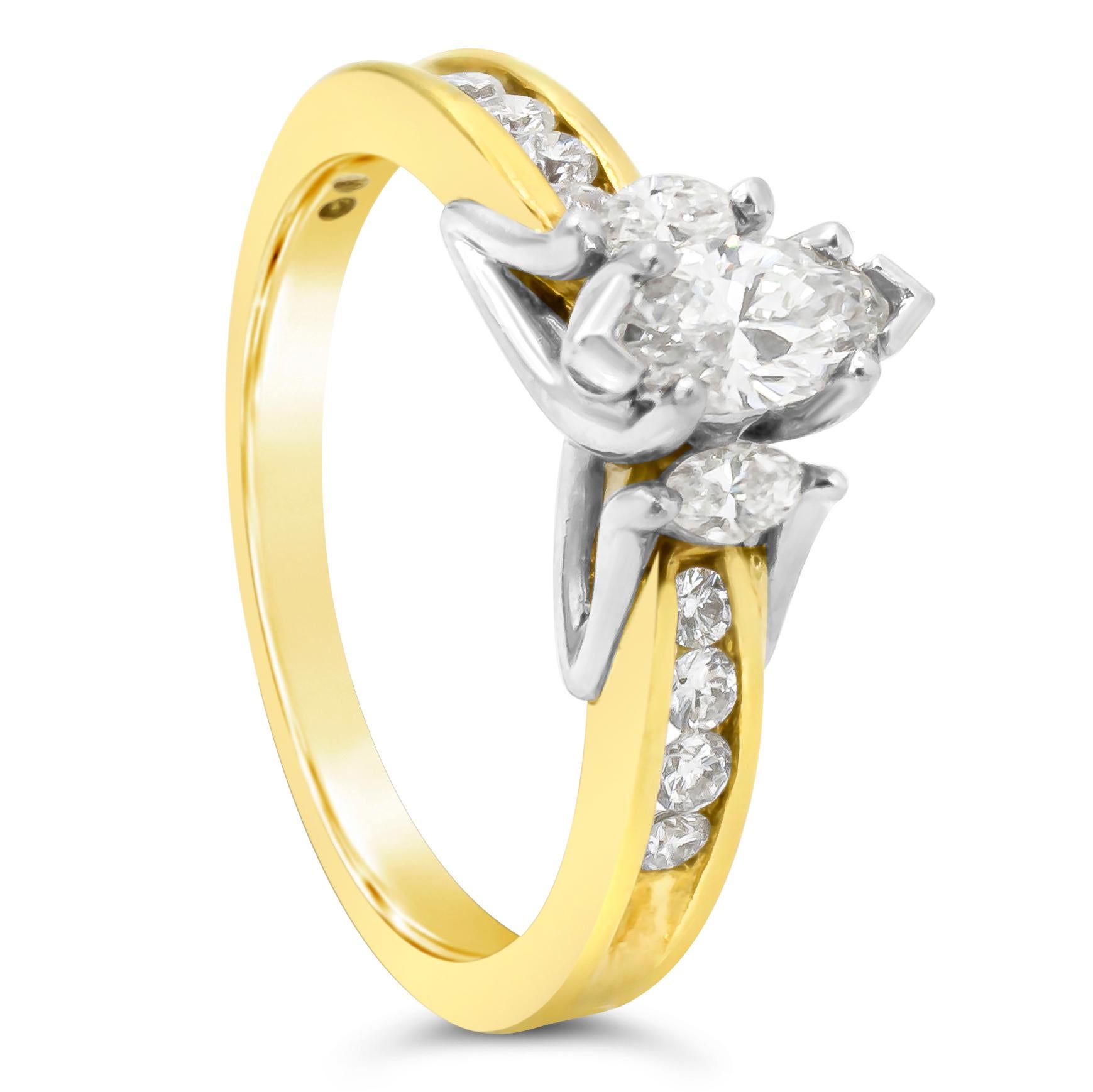 This chic and unique engagement ring showcases 0.32 carats marquise cut diamond center stone, set in a classic four prong basket setting. Flanked by tow melee marquise cut diamonds on each side and accented by brilliant round melee diamonds that