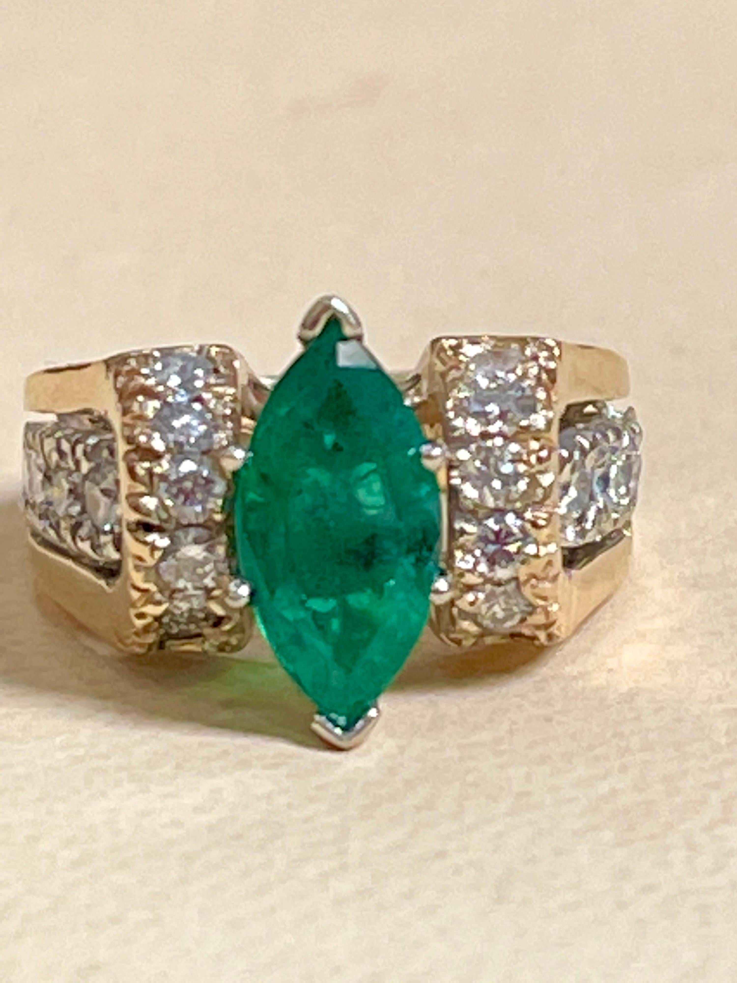 A classic, Cocktail ring 
15X7 Marquise Cut  Emerald And Diamond  Ring 14 Karat Yellow Gold Size 8
Marquis Shape  Emerald Ring 
Intense green color, Beautiful stone with shine and luster  but has small  inclusions as all natural emeralds have