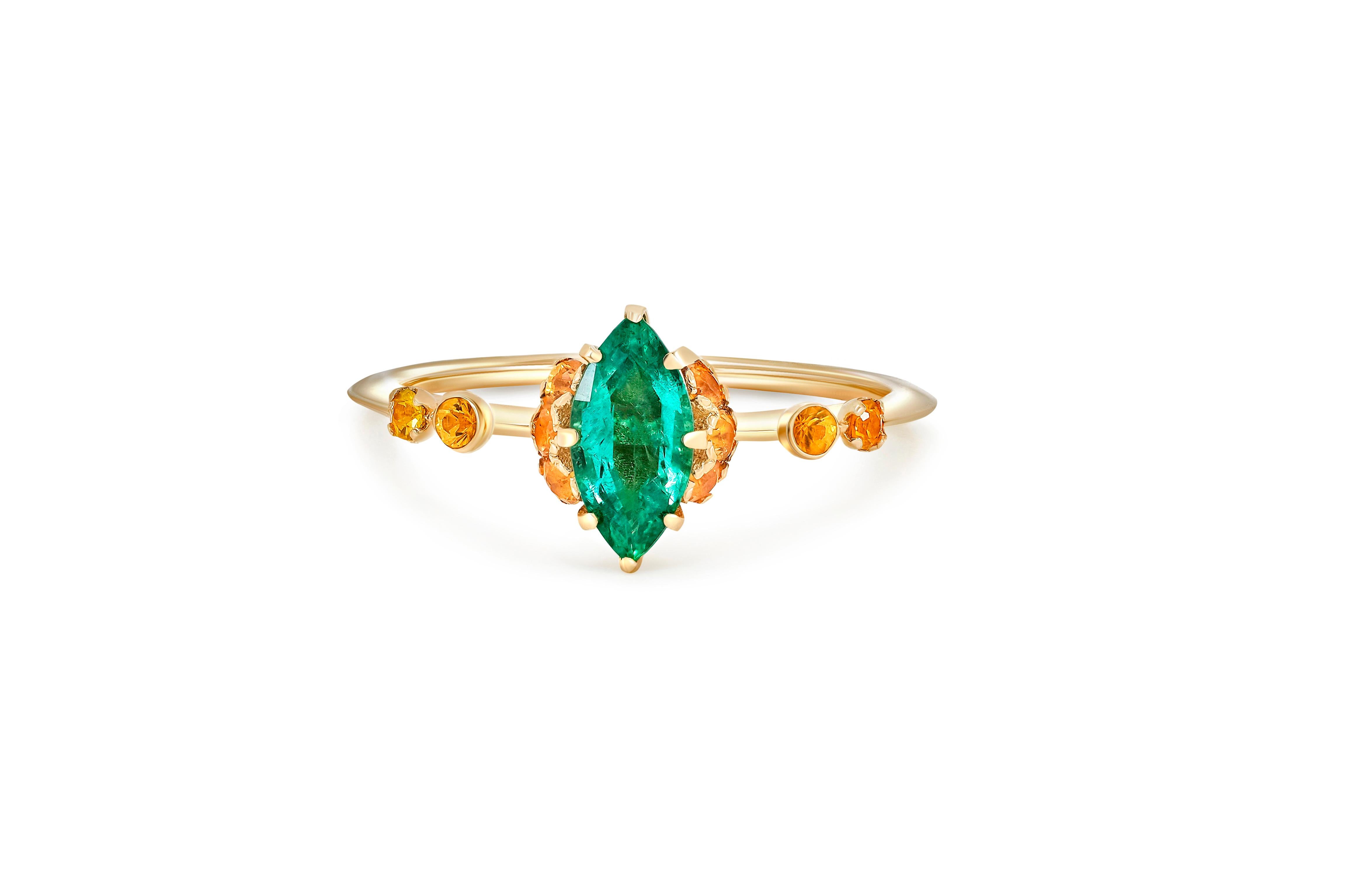 Marquise cut emerald ring. 
14 karat gold ring with emerald and sapphires. May birthstone ring. Emerald Engagement Ring. Emerald gold ring.

Metal: 14 karat gold
Weight: 1.65 g. depends from size.

Set with emerald, color - green  
Marquise cut,