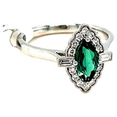 Marquise Cut Green Sapphire Halo Diamond Ring
