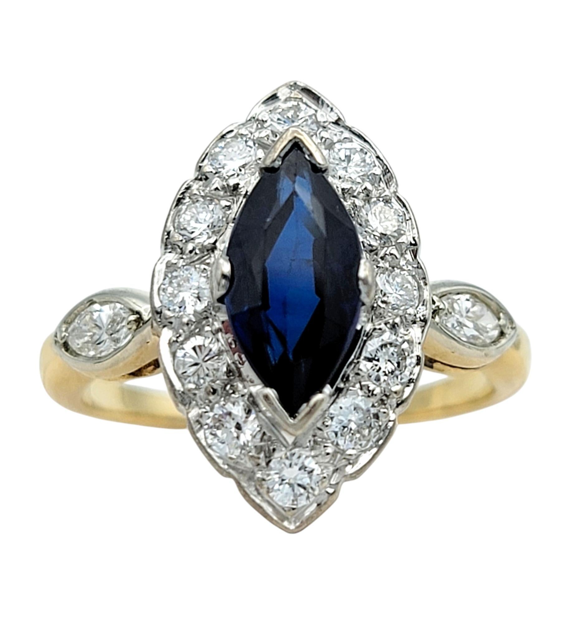 Indulge in the timeless beauty of this striking vintage inspired cocktail ring. At its heart lies a striking lab grown marquise-cut sapphire, radiating a deep, captivating blue that exudes elegance and sophistication. Surrounding the centerpiece,